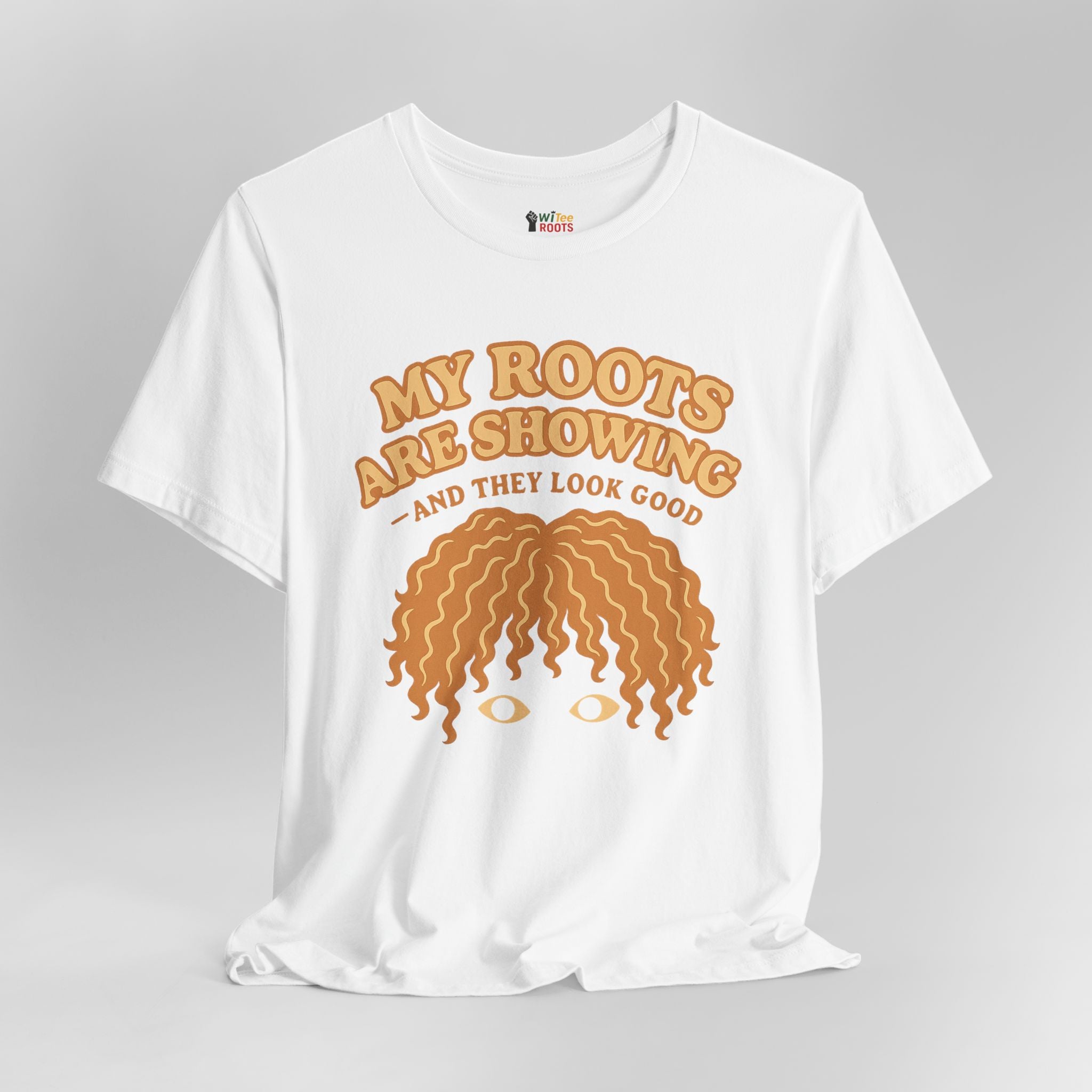 White t-shirt with brown graphic and text on a gray background