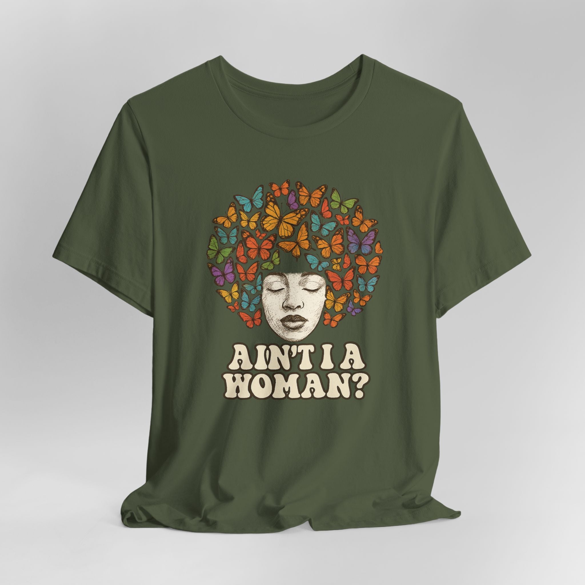 Green t-shirt with a colorful butterfly design and text on a gray background
