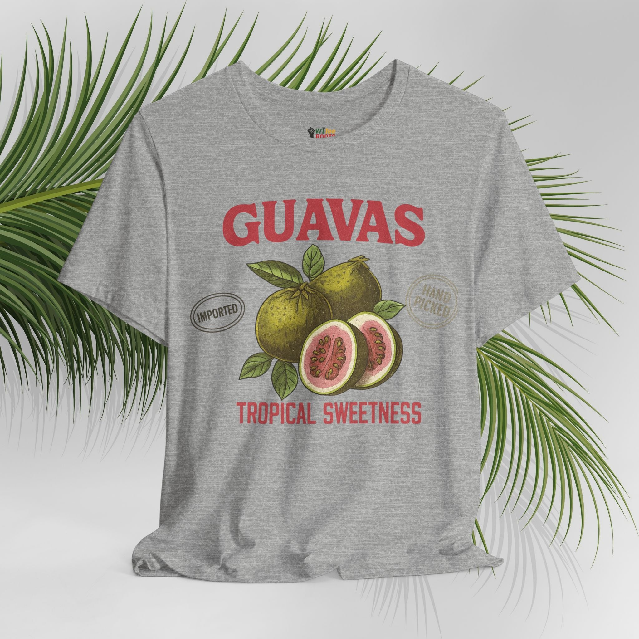 Gray t-shirt with guava graphic and text on a white background with green leaves.