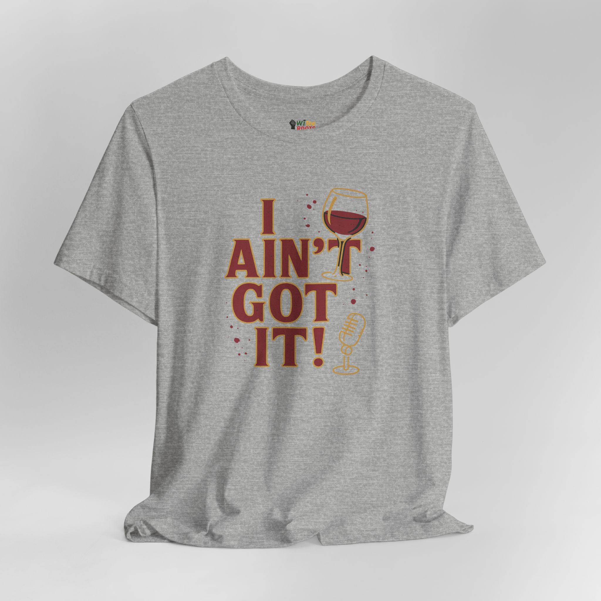 Gray t-shirt with humorous graphic and text on a light gray background