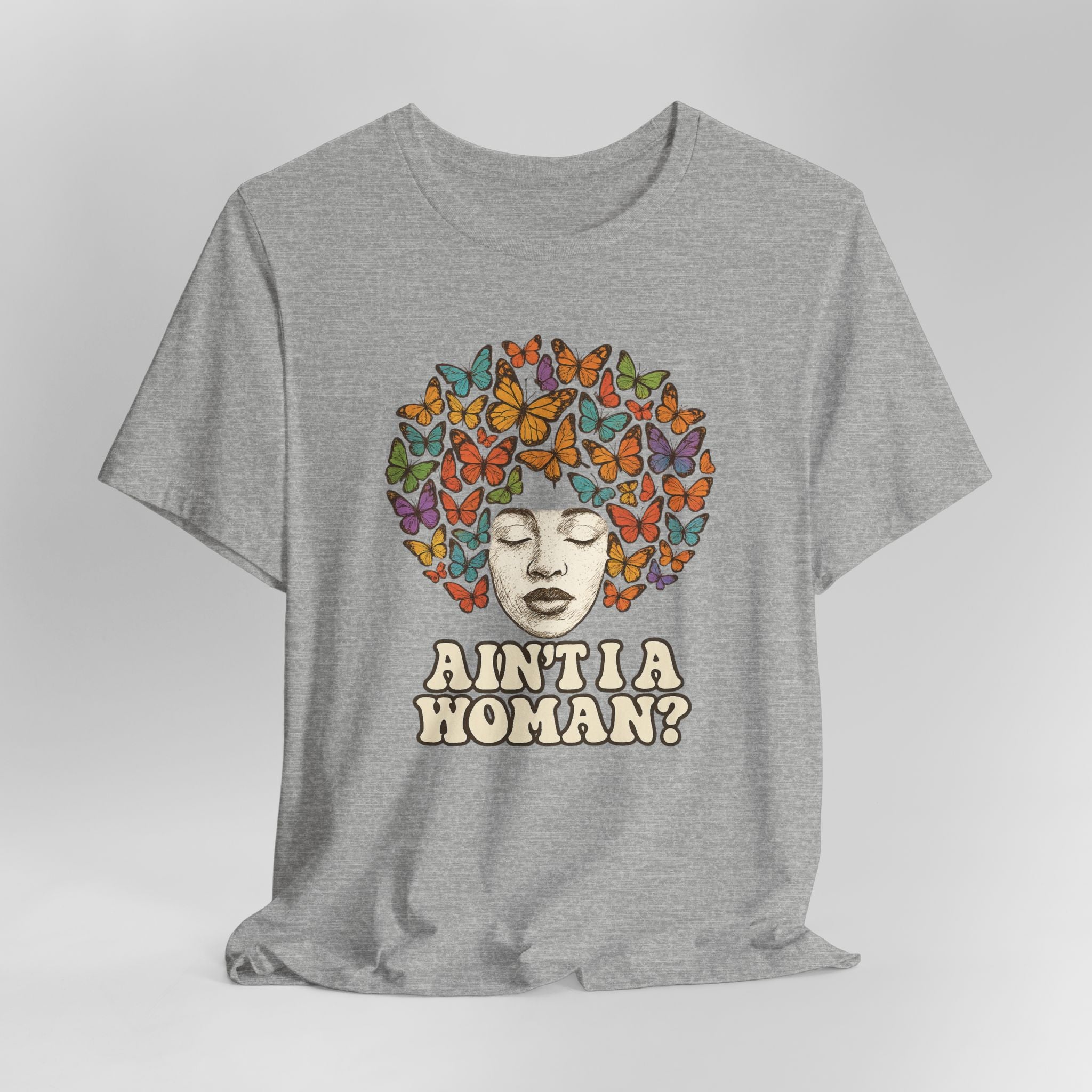 Gray t-shirt with a colorful butterfly design and text on a light gray background