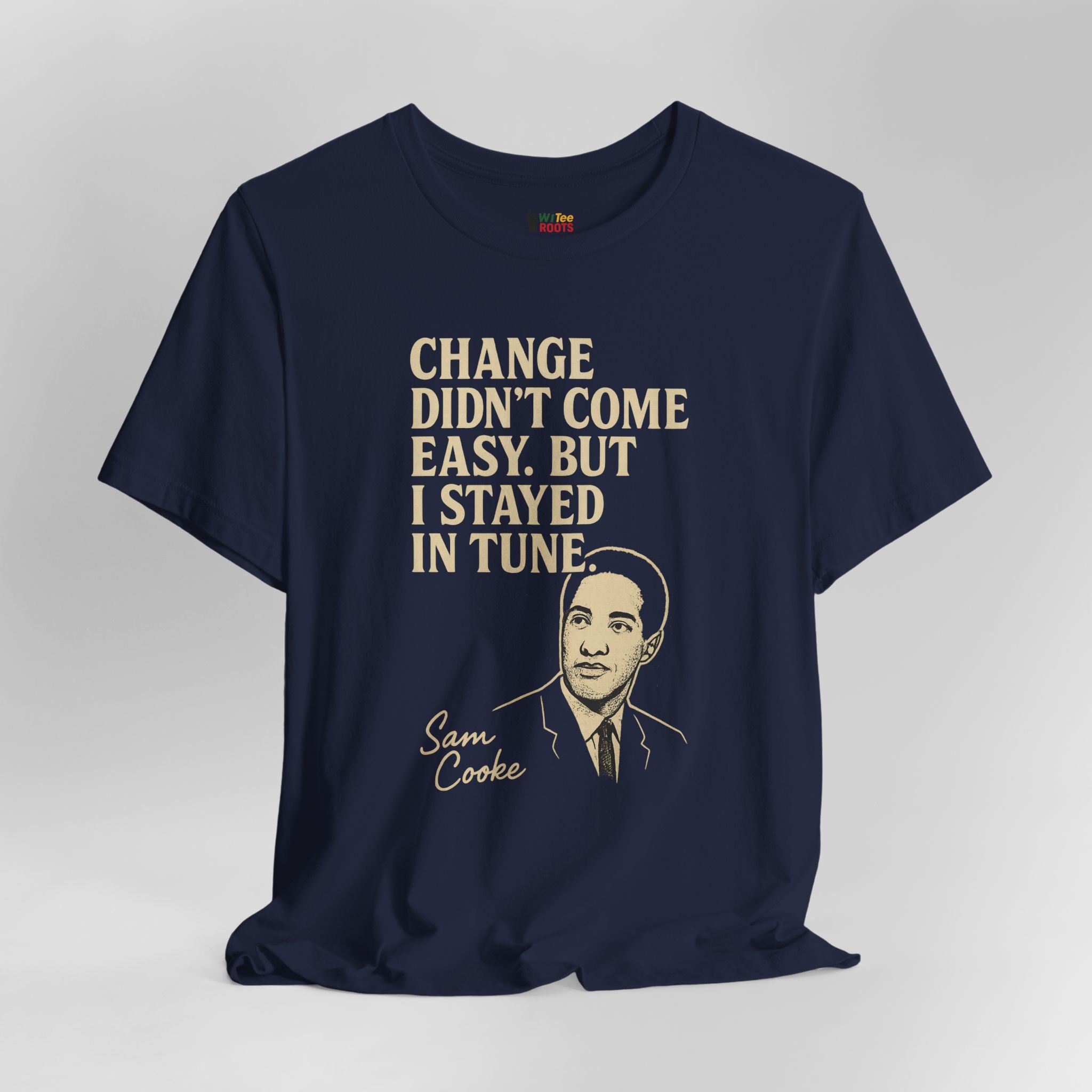 Navy blue t-shirt with text and a portrait on a gray background