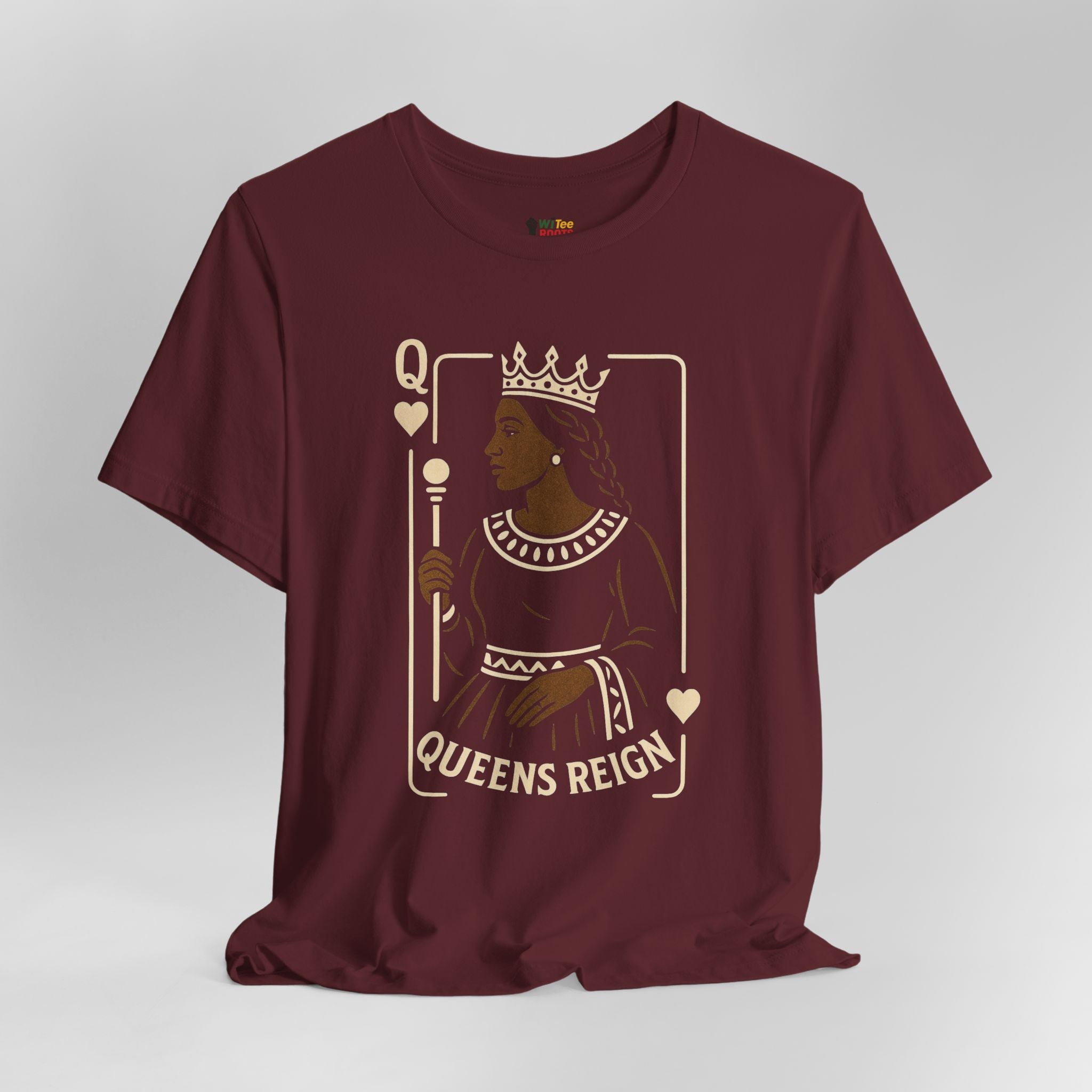 Maroon t-shirt with 'Queens Reign' graphic design on a white background