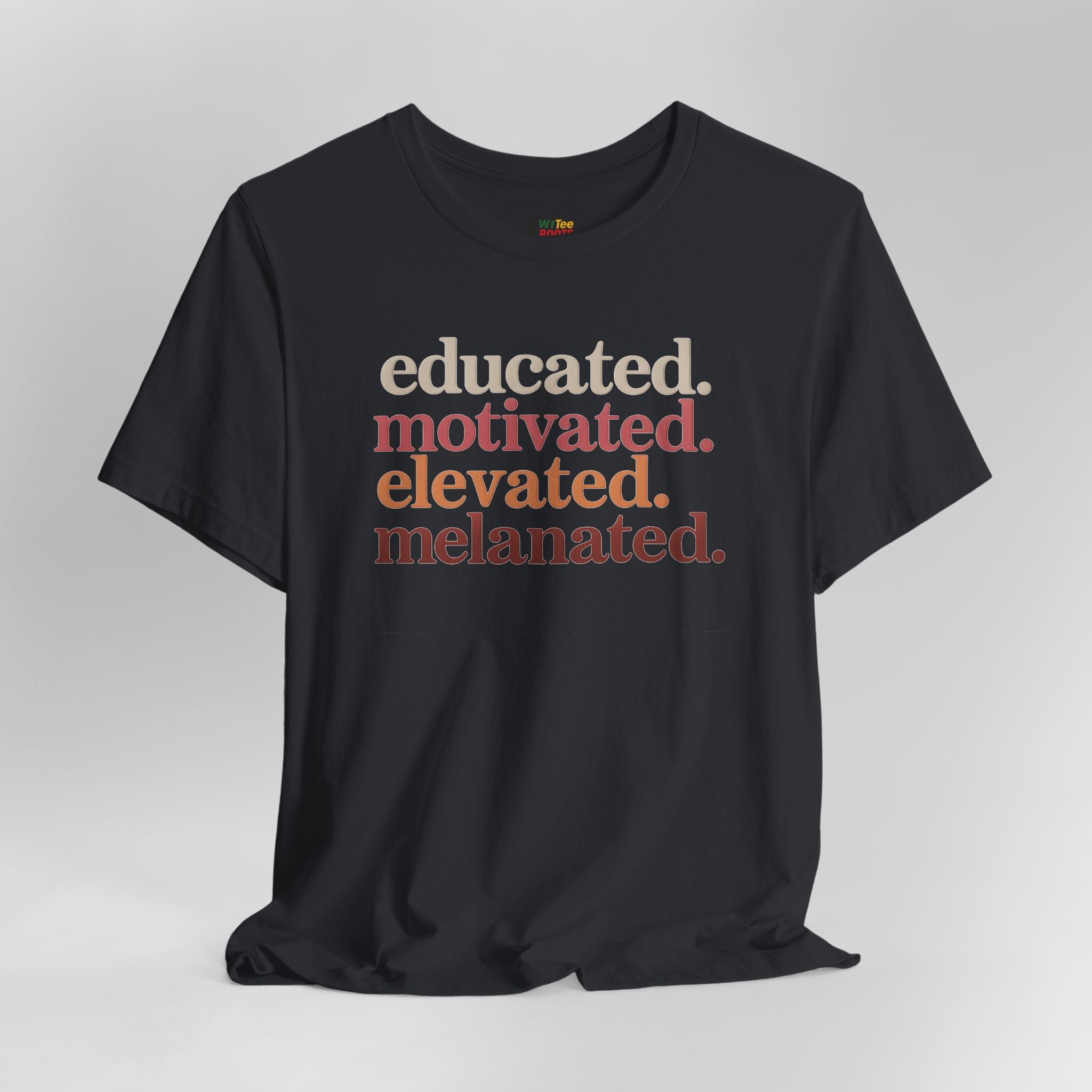 Black t-shirt with motivational text on a gray background