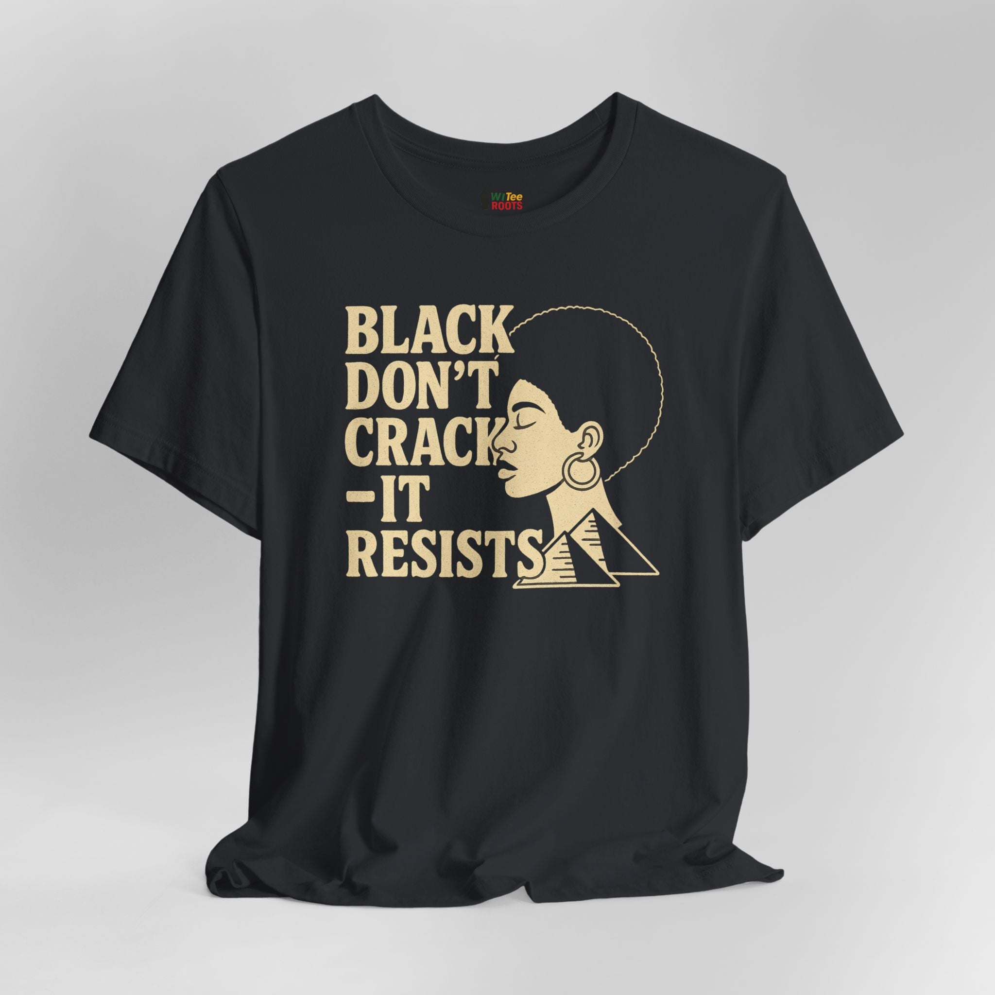 Black t-shirt with a graphic of a woman's face and text 'BLACK DON'T CRACK IT RESISTS' on a gray background