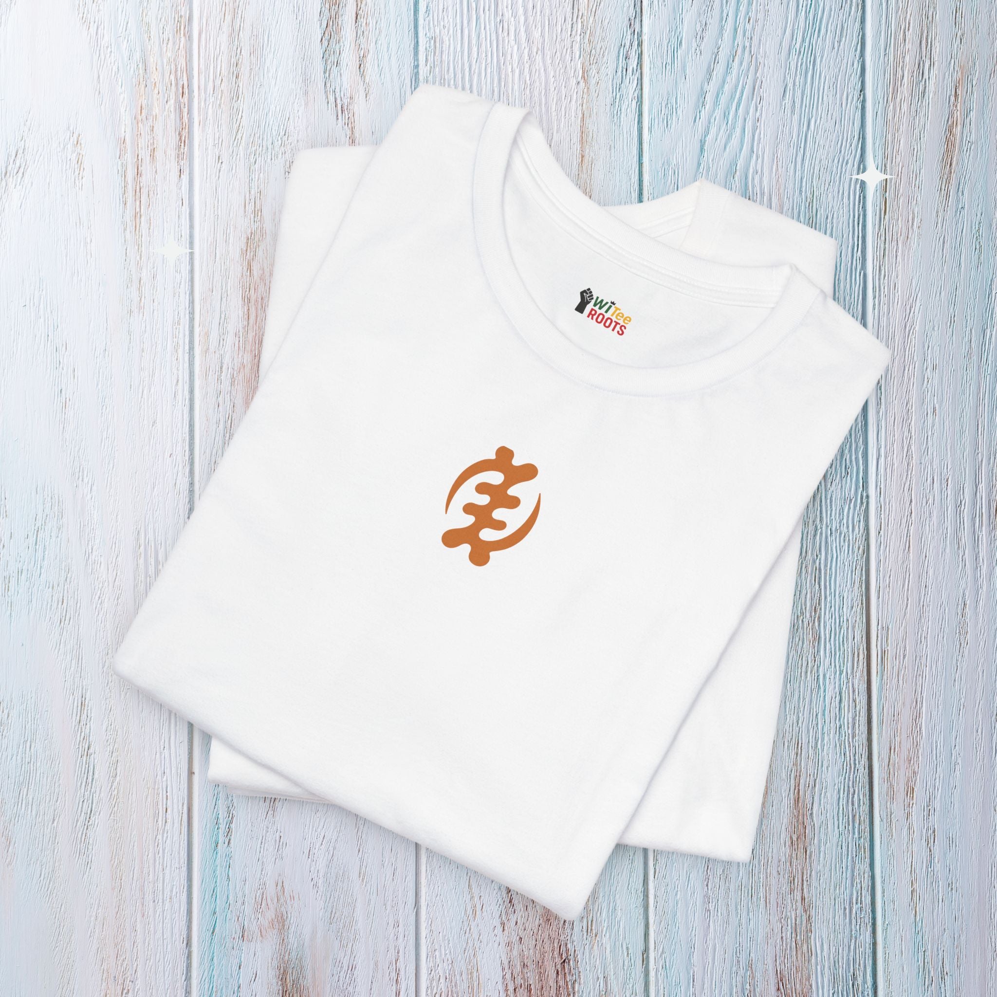 White t-shirt with a logo on a light wooden surface