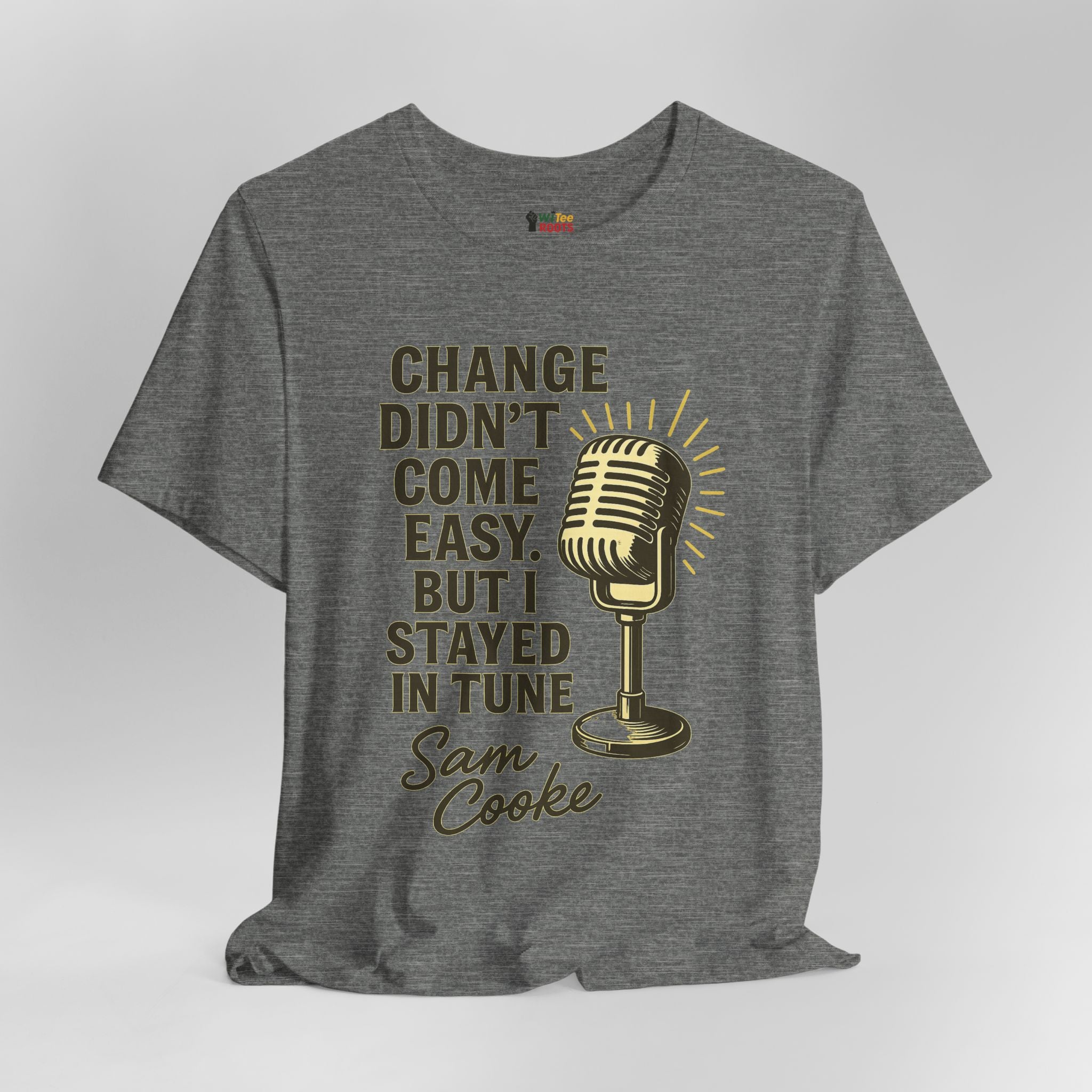 Gray t-shirt with gold microphone graphic and text on a white background