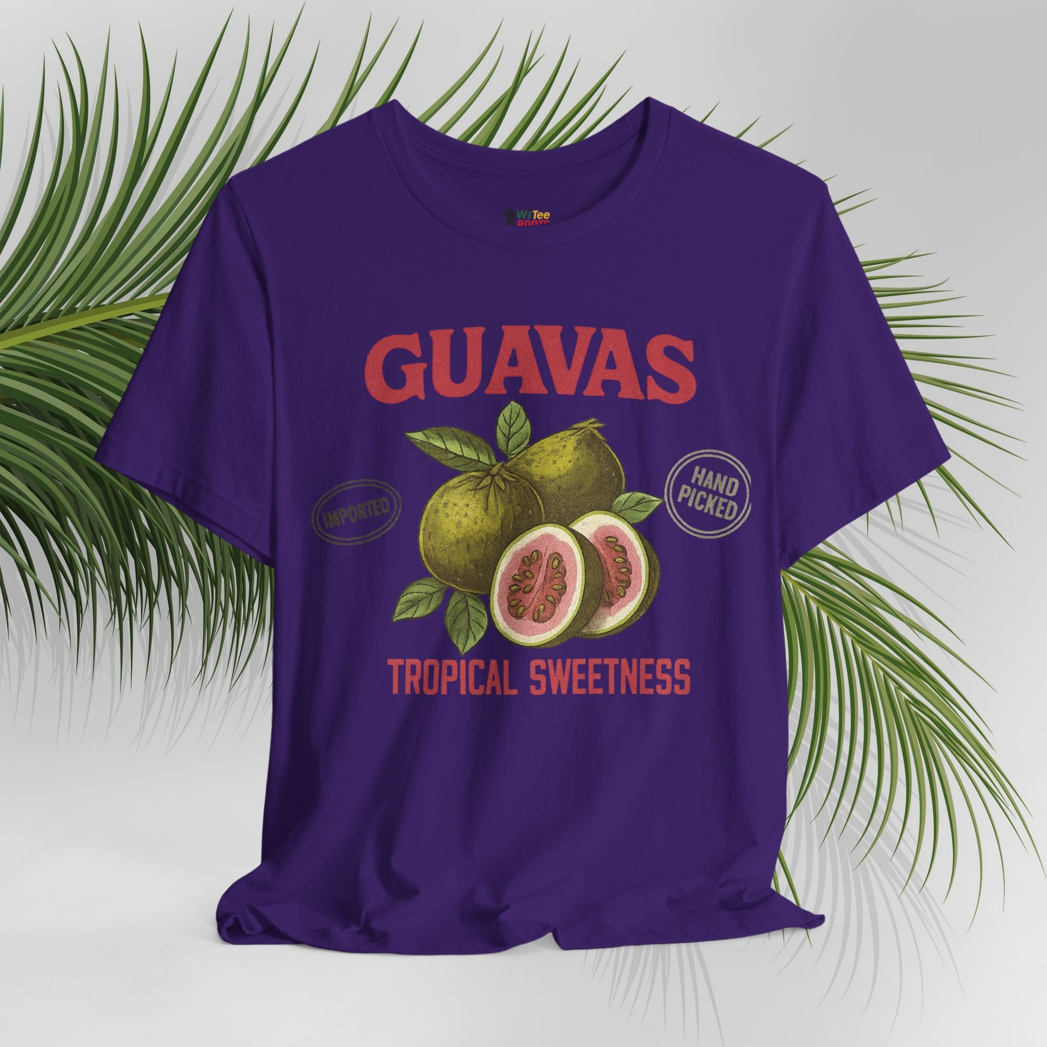 Purple t-shirt with guava graphic and text on a white background with green leaves.
