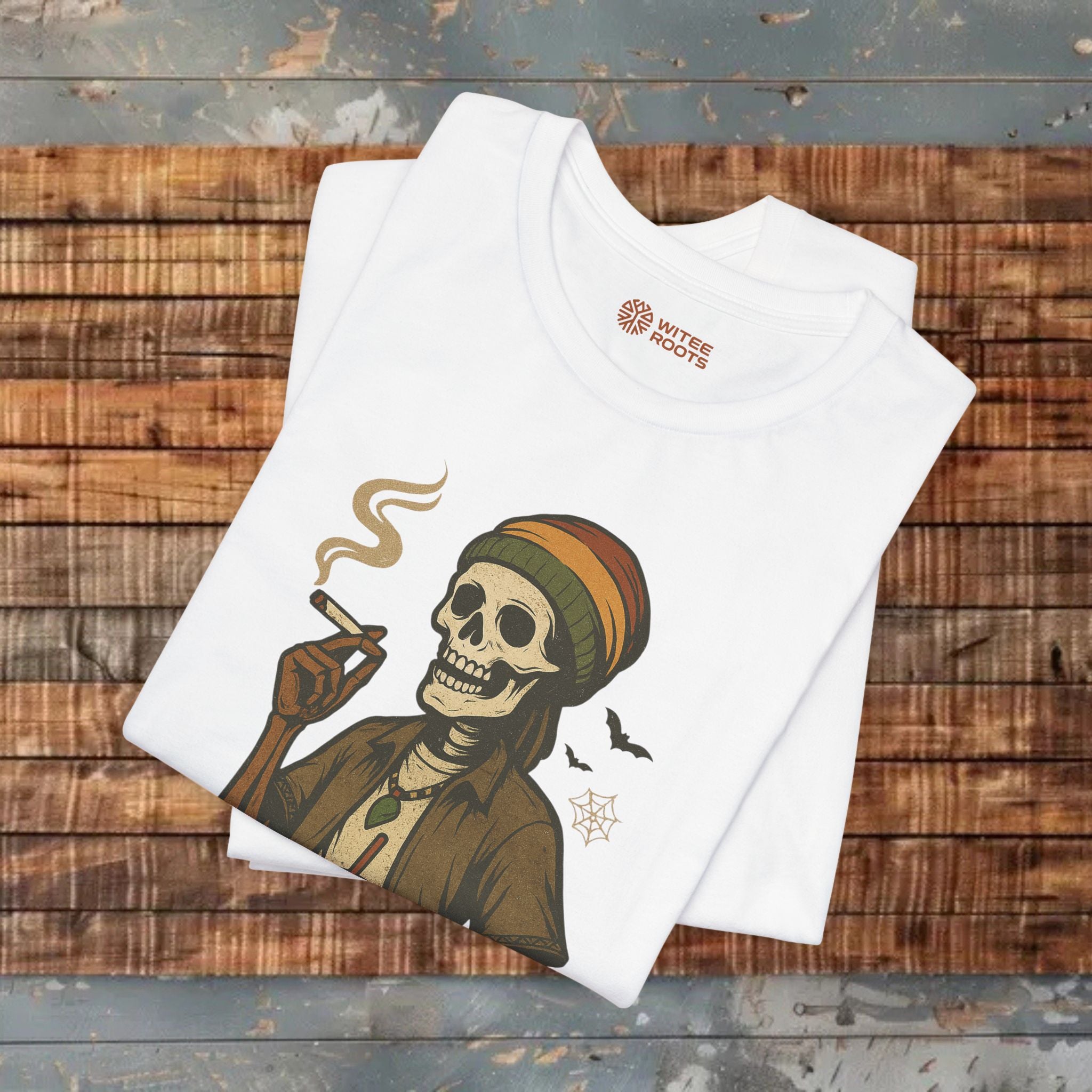 White t-shirt with a skeleton design on a wooden surface