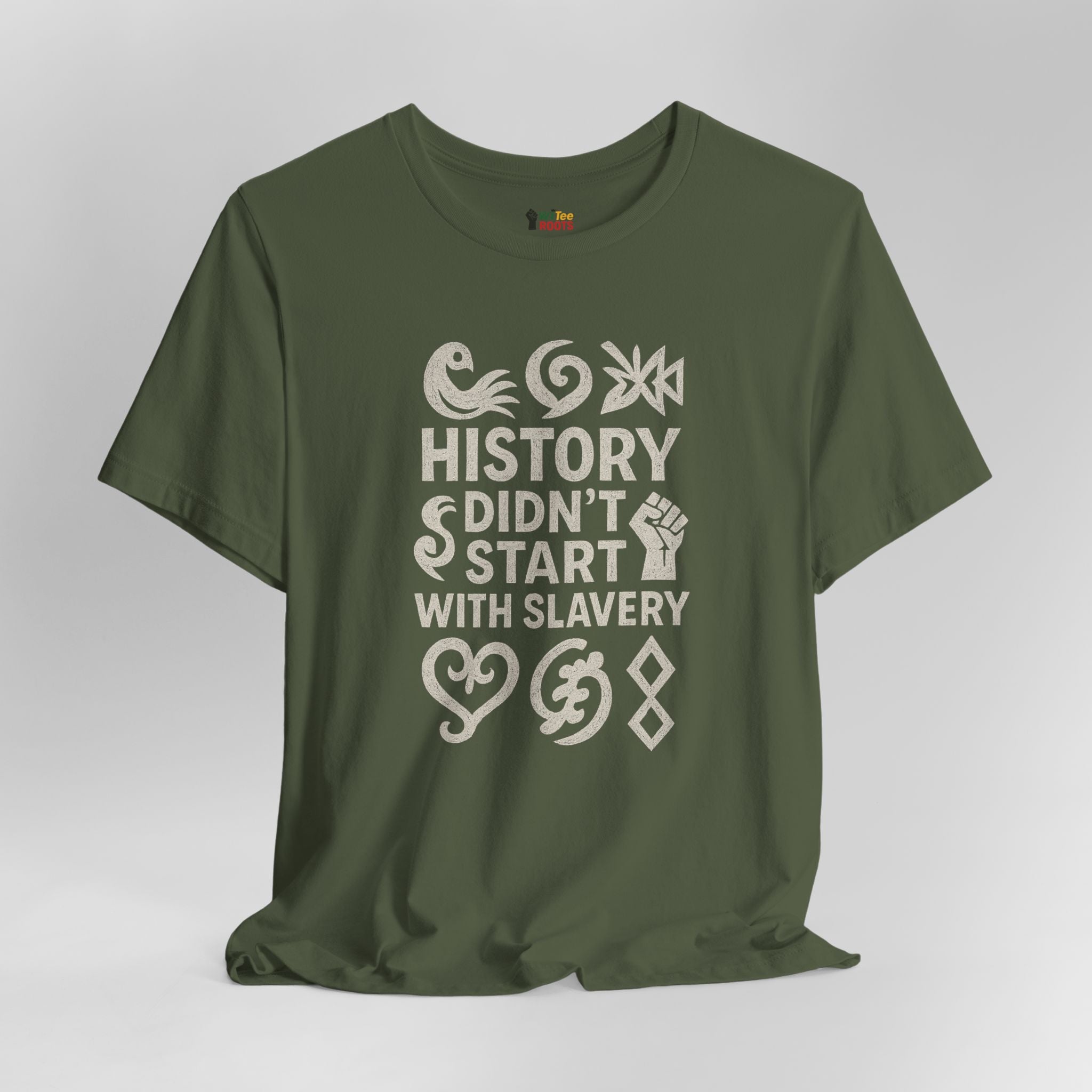 Green t-shirt with white text and symbols on a gray background