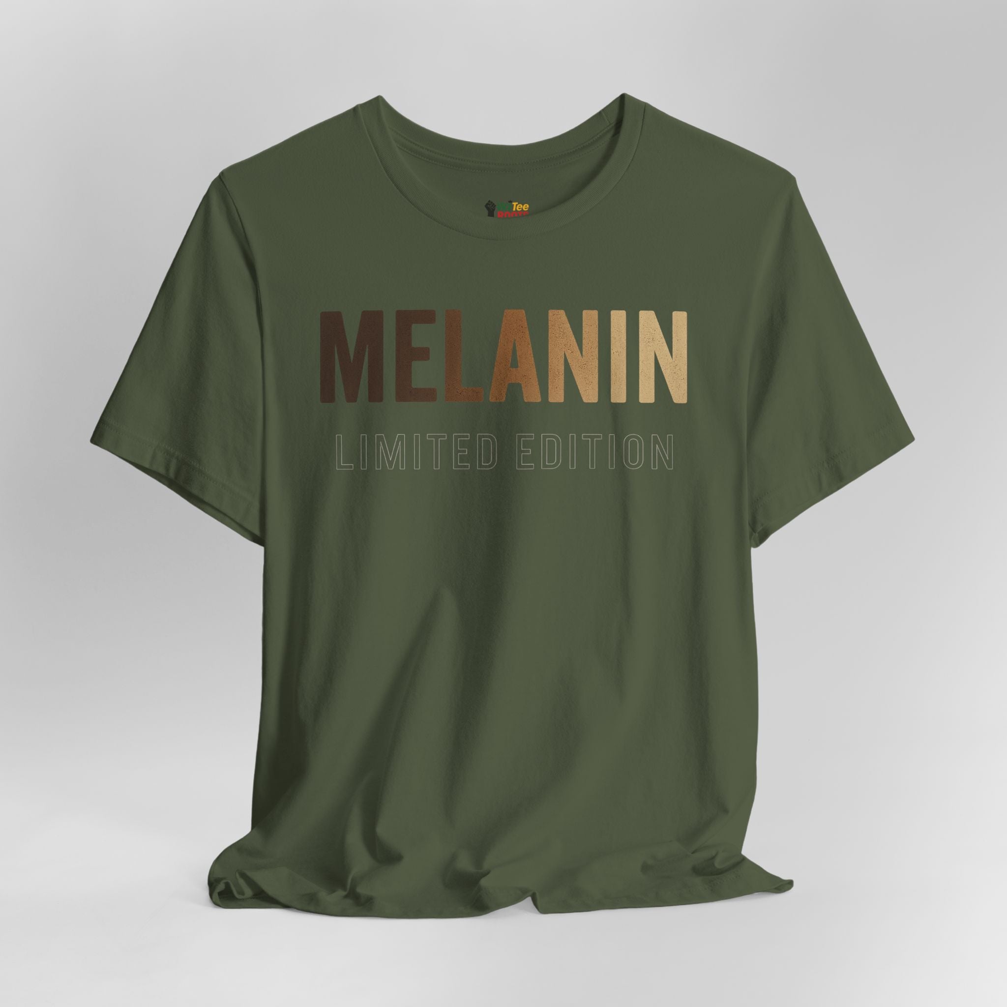 Green t-shirt with 'MELANIN LIMITED EDITION' text on a white background