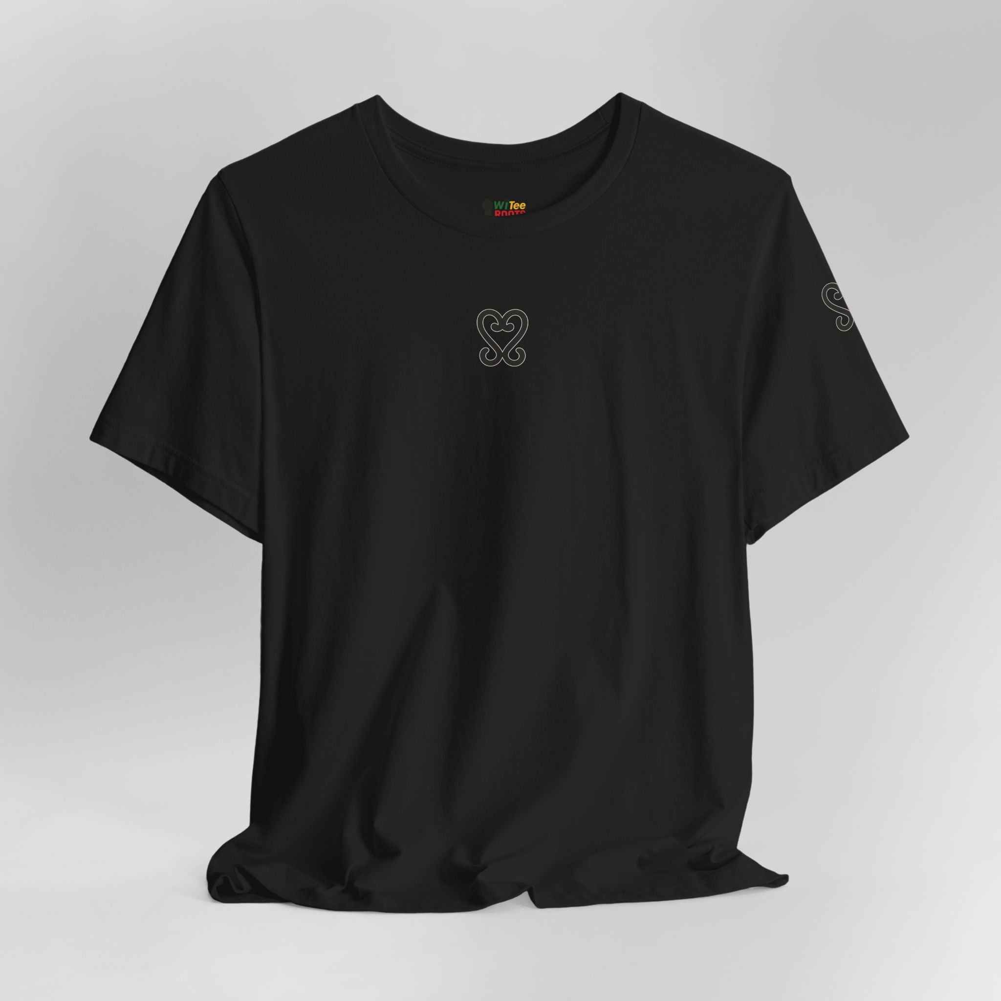 Black t-shirt with a small logo on a light gray background