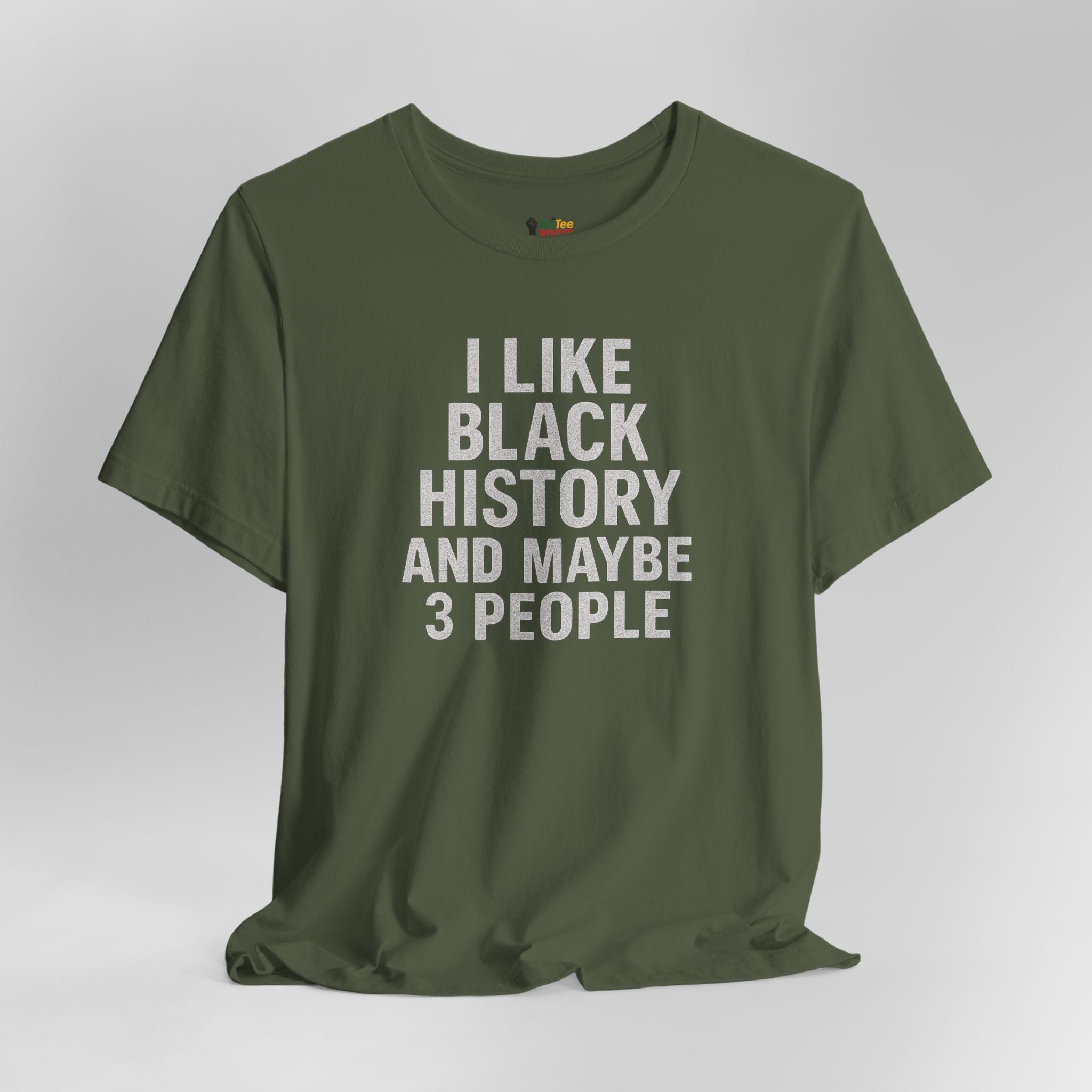 Green t-shirt with white text on a gray background