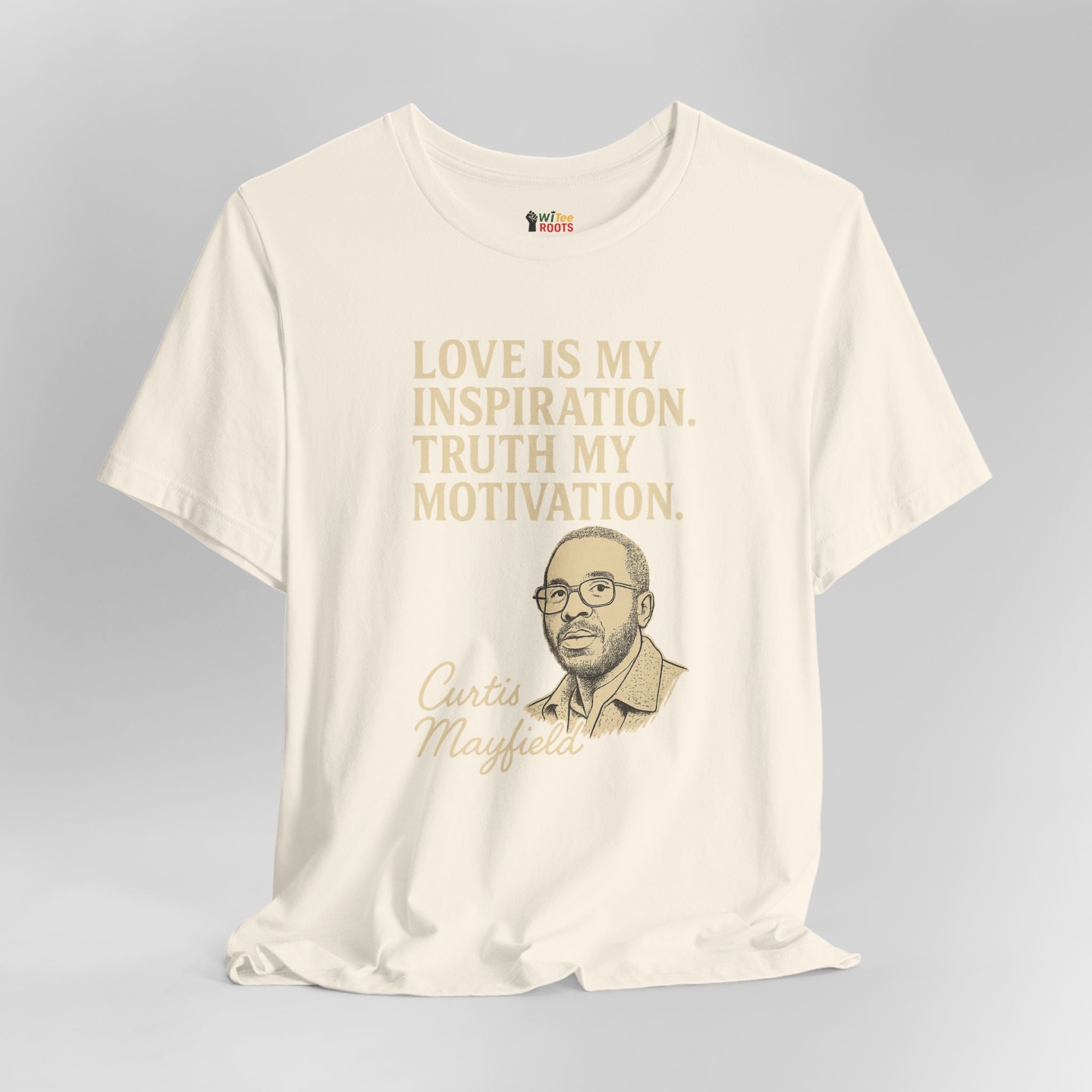 Beige t-shirt with a graphic of a man and text on a gray background