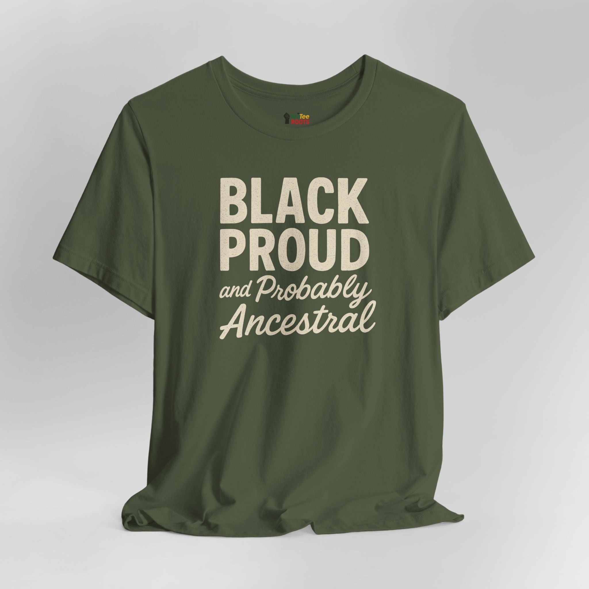 Green t-shirt with 'Black Proud and Probably Ancestral' text on a gray background