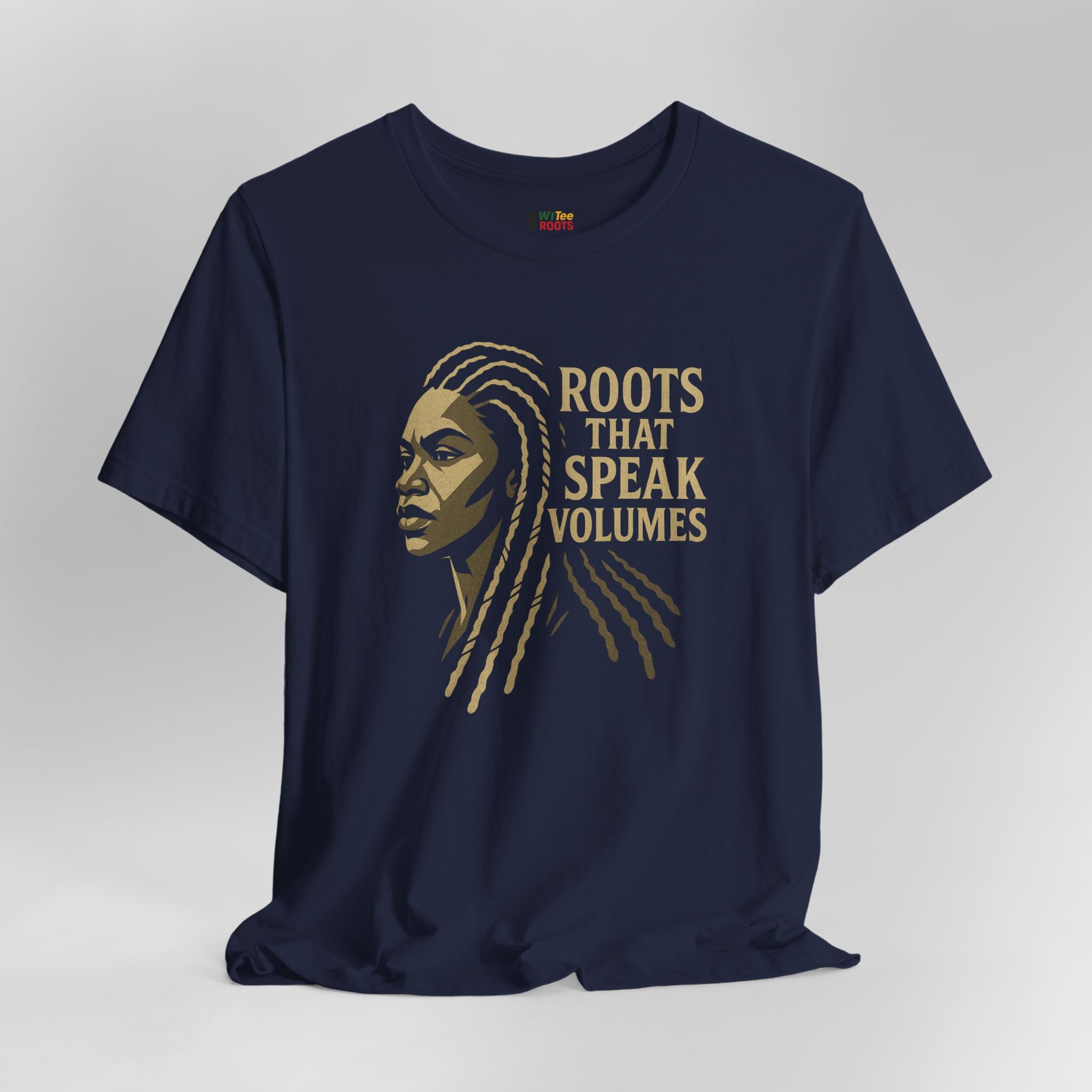 Navy blue t-shirt with gold graphic and text 'ROOTS THAT SPEAK VOLUMES' on a light gray background