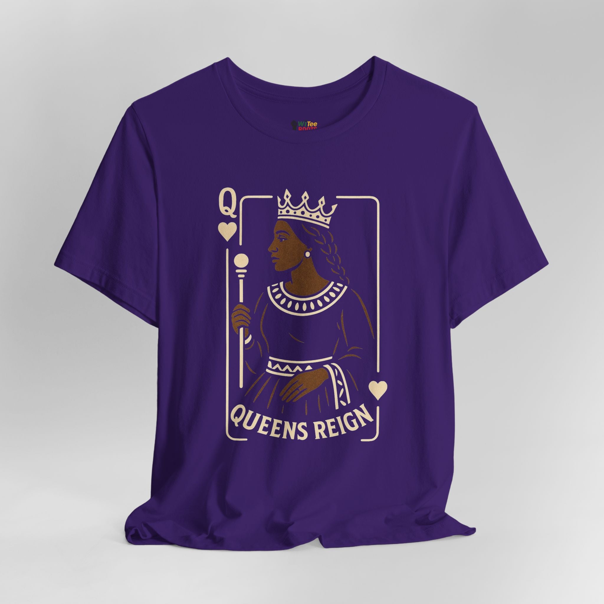 Purple t-shirt with a graphic of a queen and 'Queens Reign' text on a gray background