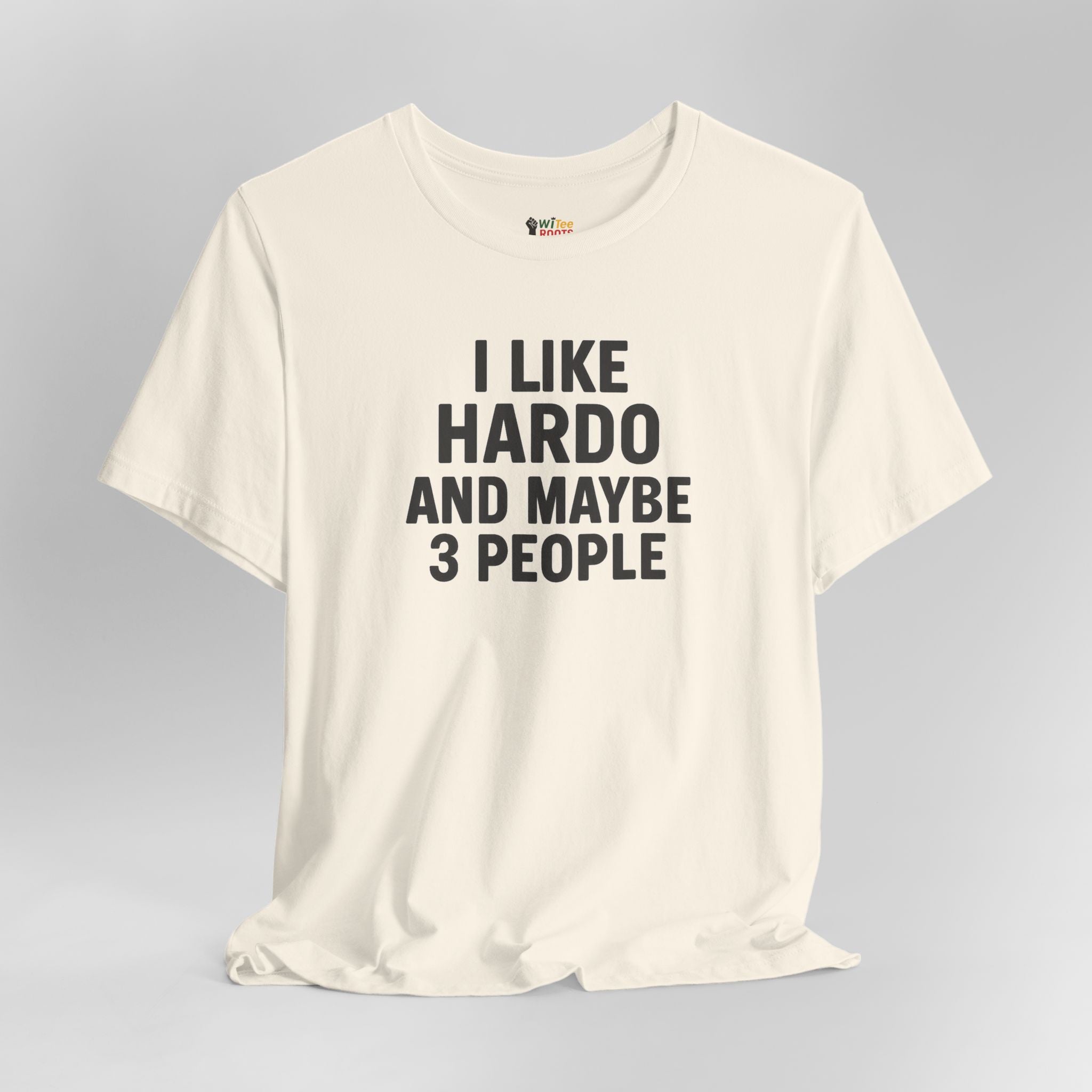 Cream t-shirt with text 'I LIKE HARDO AND MAYBE 3 PEOPLE' on a gray background