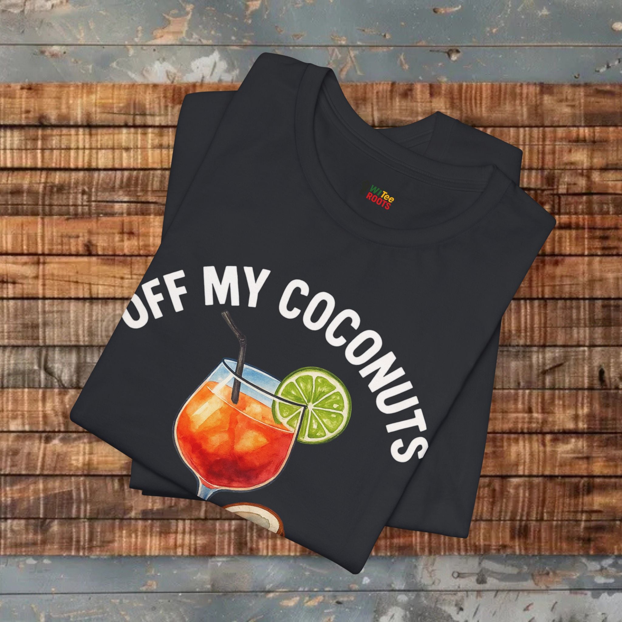 Black t-shirt with 'OFF MY COCONUTS' graphic on a wooden surface