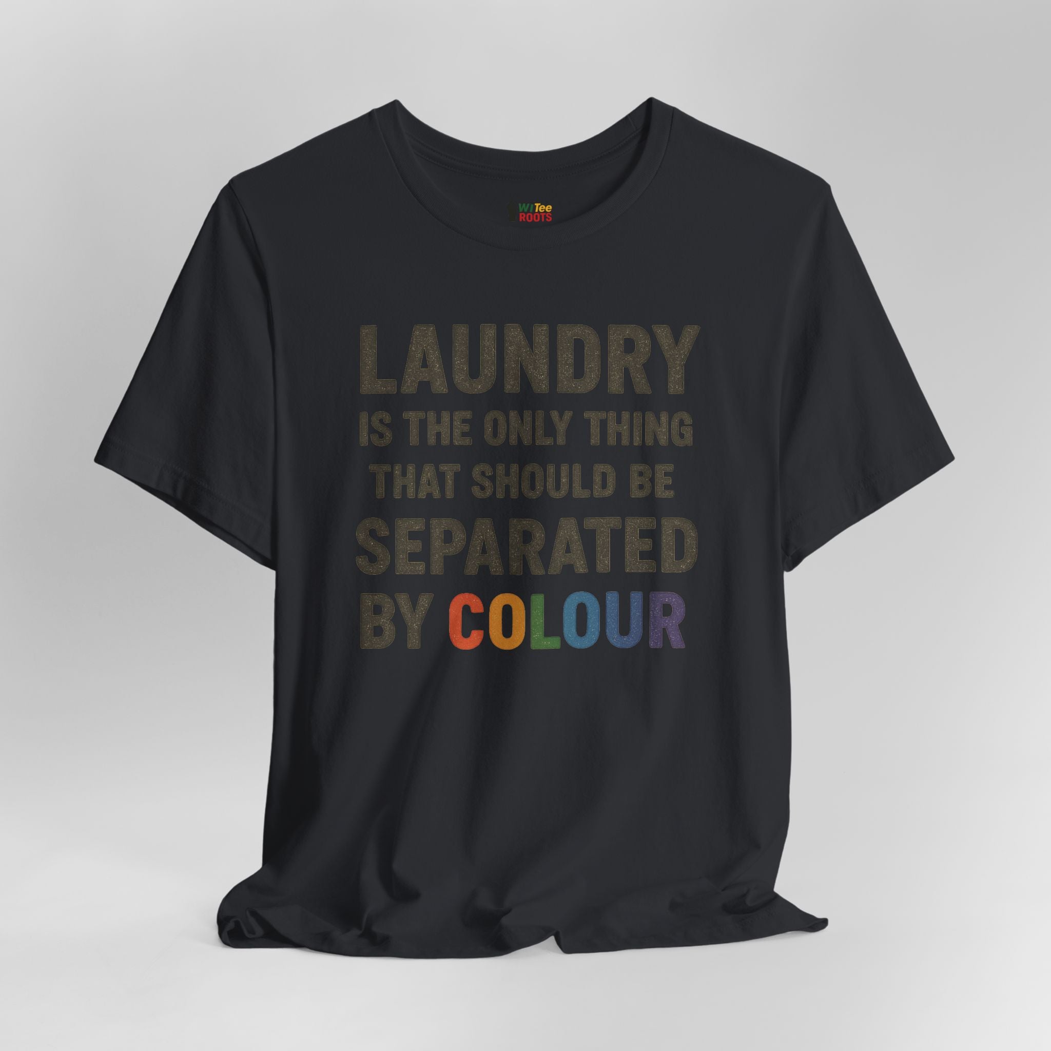 Black t-shirt with colorful text on a gray background