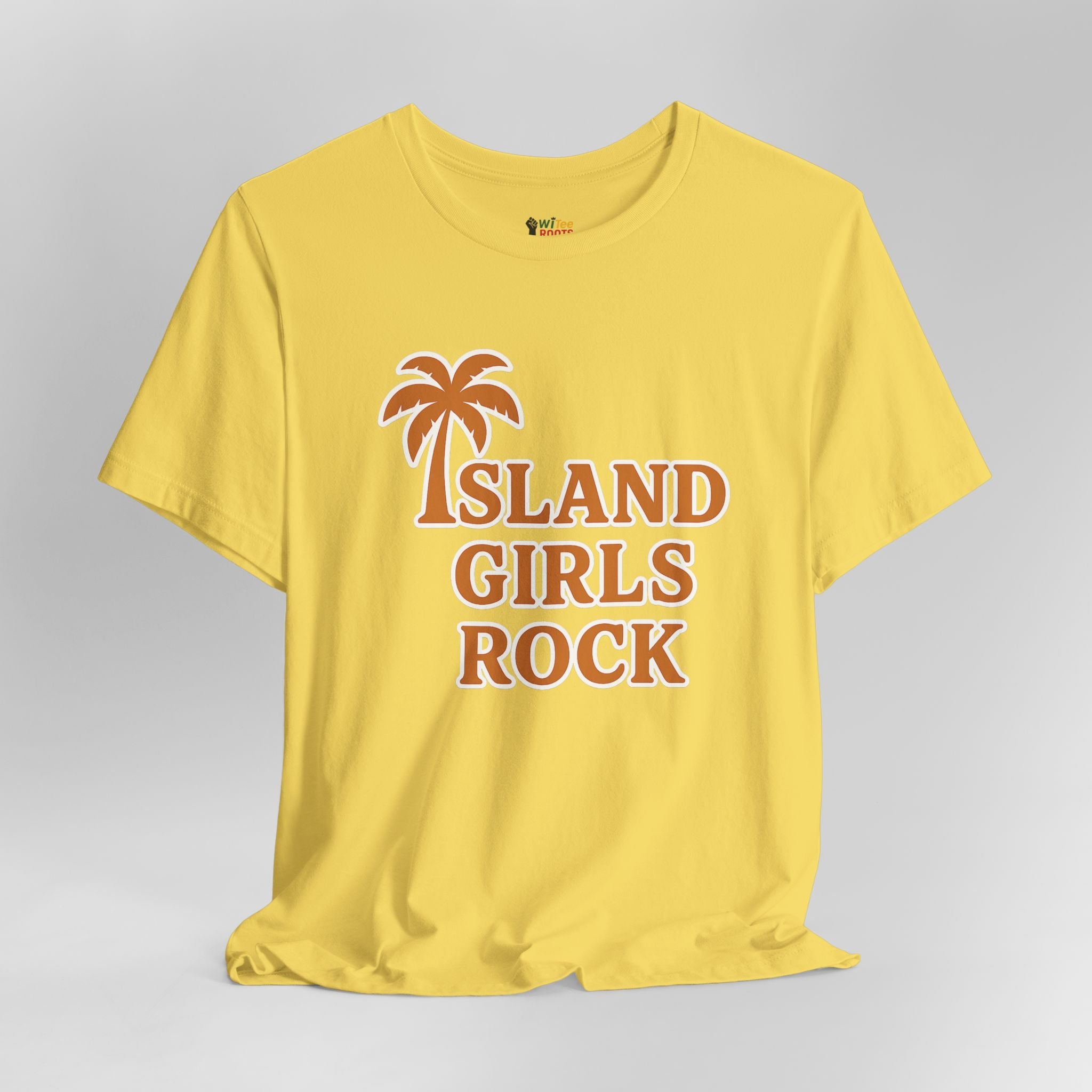 Yellow t-shirt with 'Island Girls Rock' text and palm tree design on a gray background