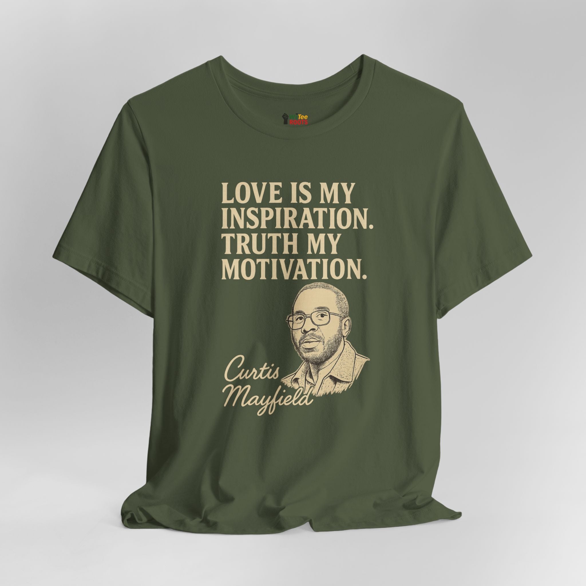 Green t-shirt with text and a portrait on a gray background
