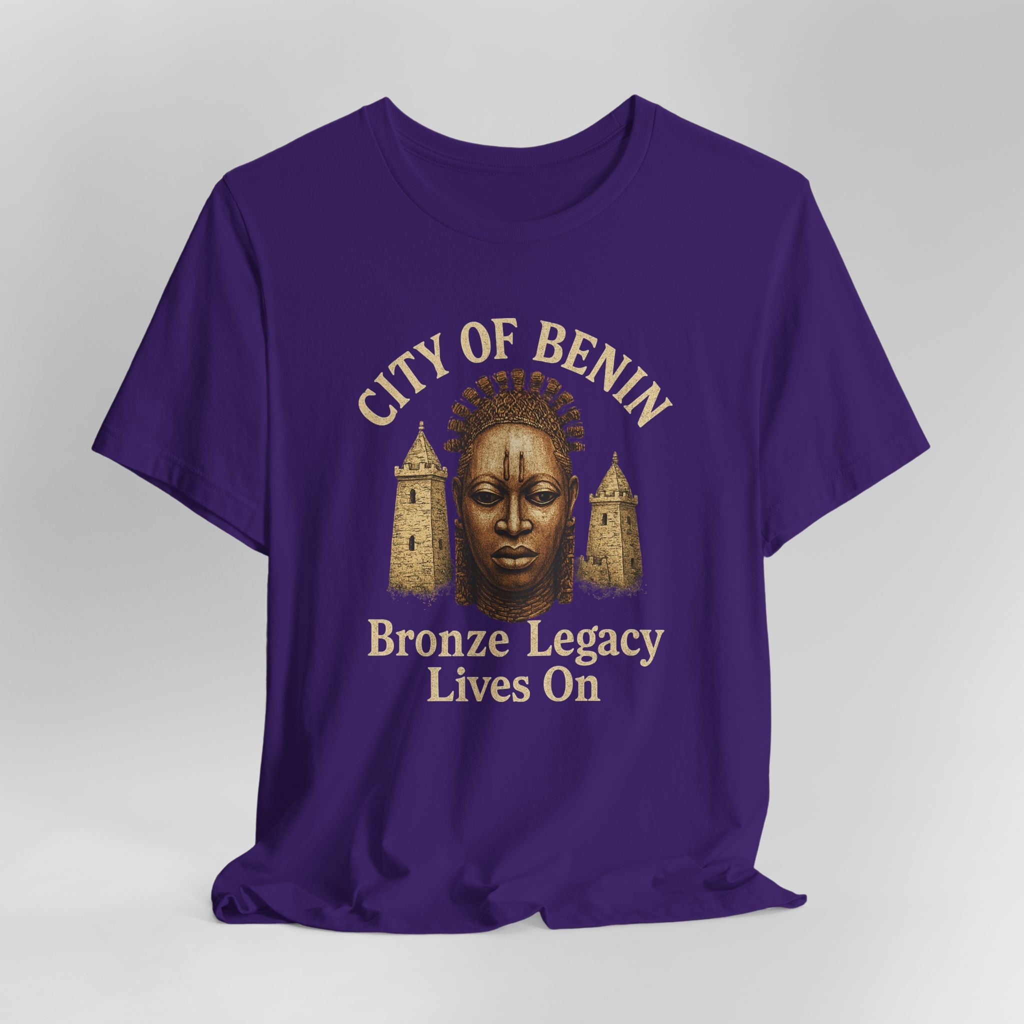 Purple t-shirt with 'City of Benin Bronze Legacy Lives On' design on a gray background