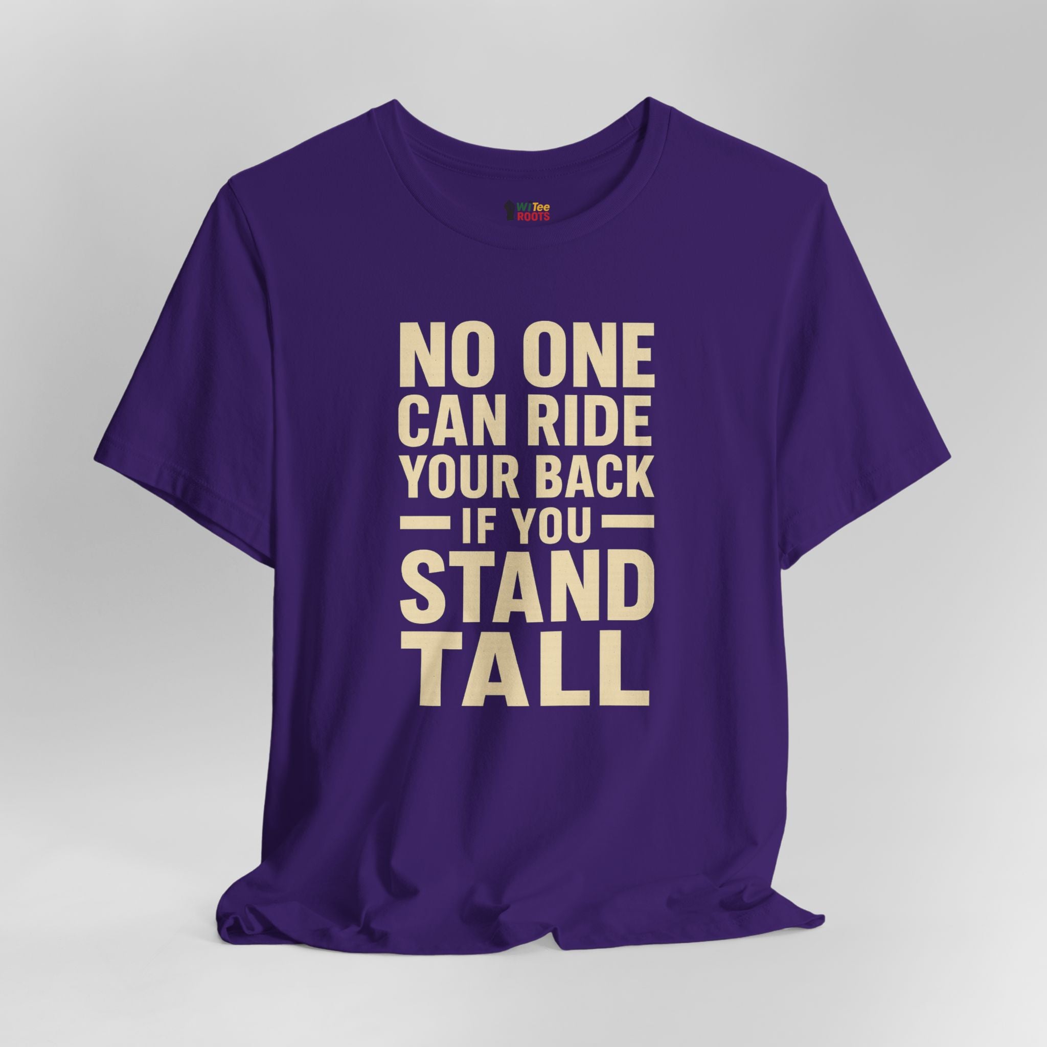 Purple t-shirt with motivational quote on a gray background