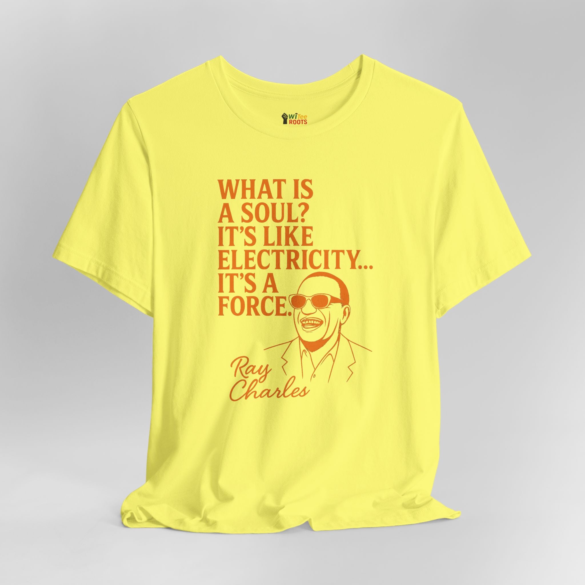 Yellow t-shirt with Ray Charles quote on a gray background