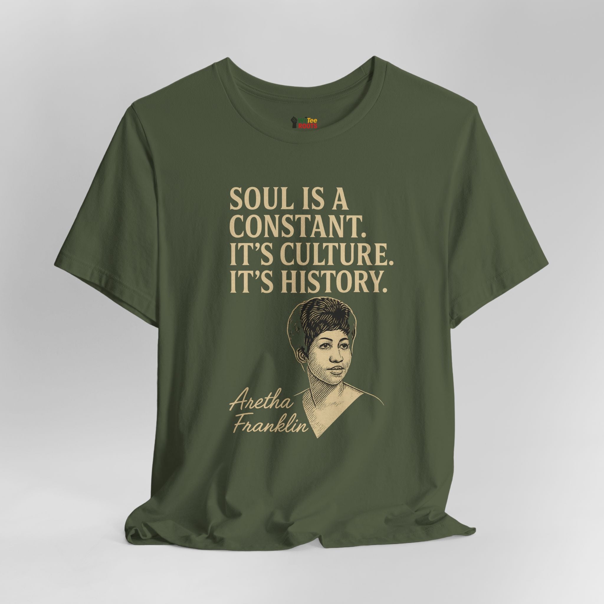 Green t-shirt with a quote and portrait of Aretha Franklin on a gray background