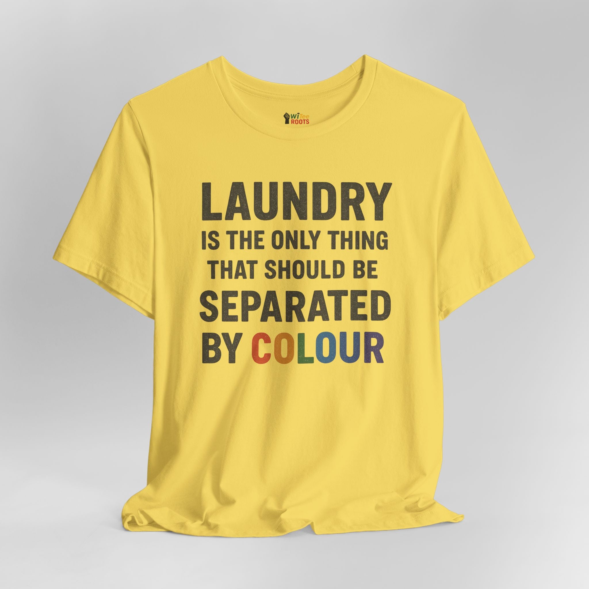 Yellow t-shirt with humorous laundry text on a gray background