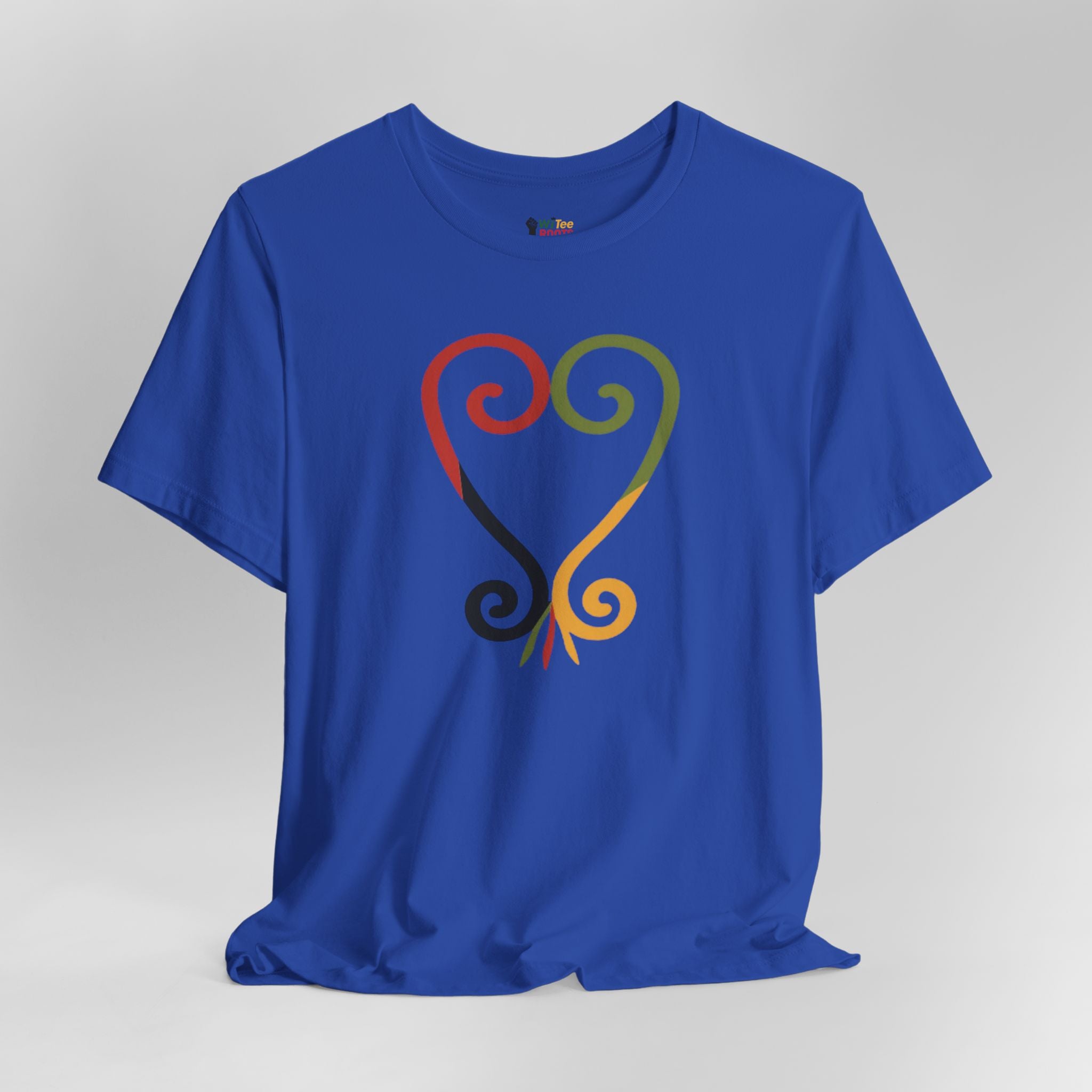 Blue t-shirt with colorful abstract design on a gray background