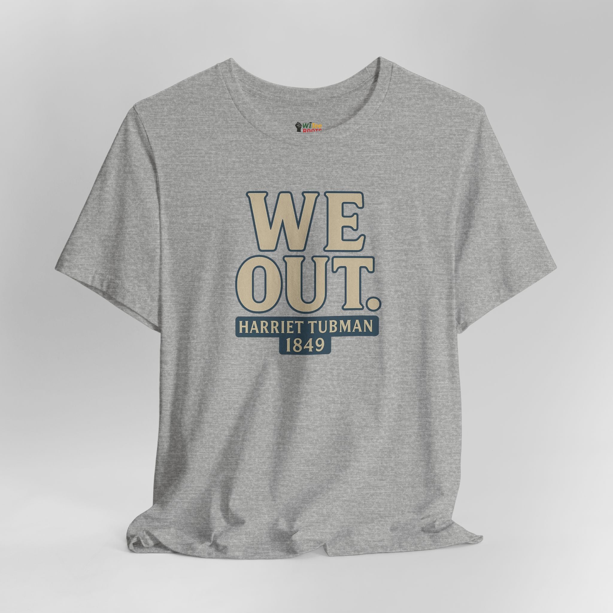 Gray t-shirt with 'WE OUT. HARRIET TUBMAN 1849' text on a light gray background