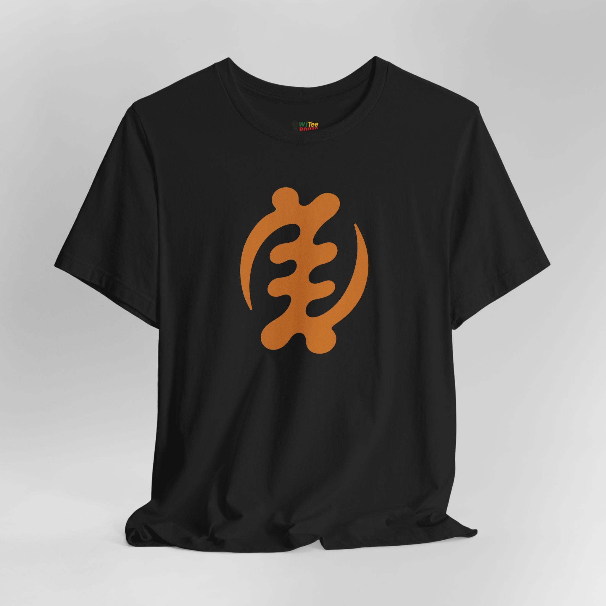 Black t-shirt with an orange symbol on a gray background