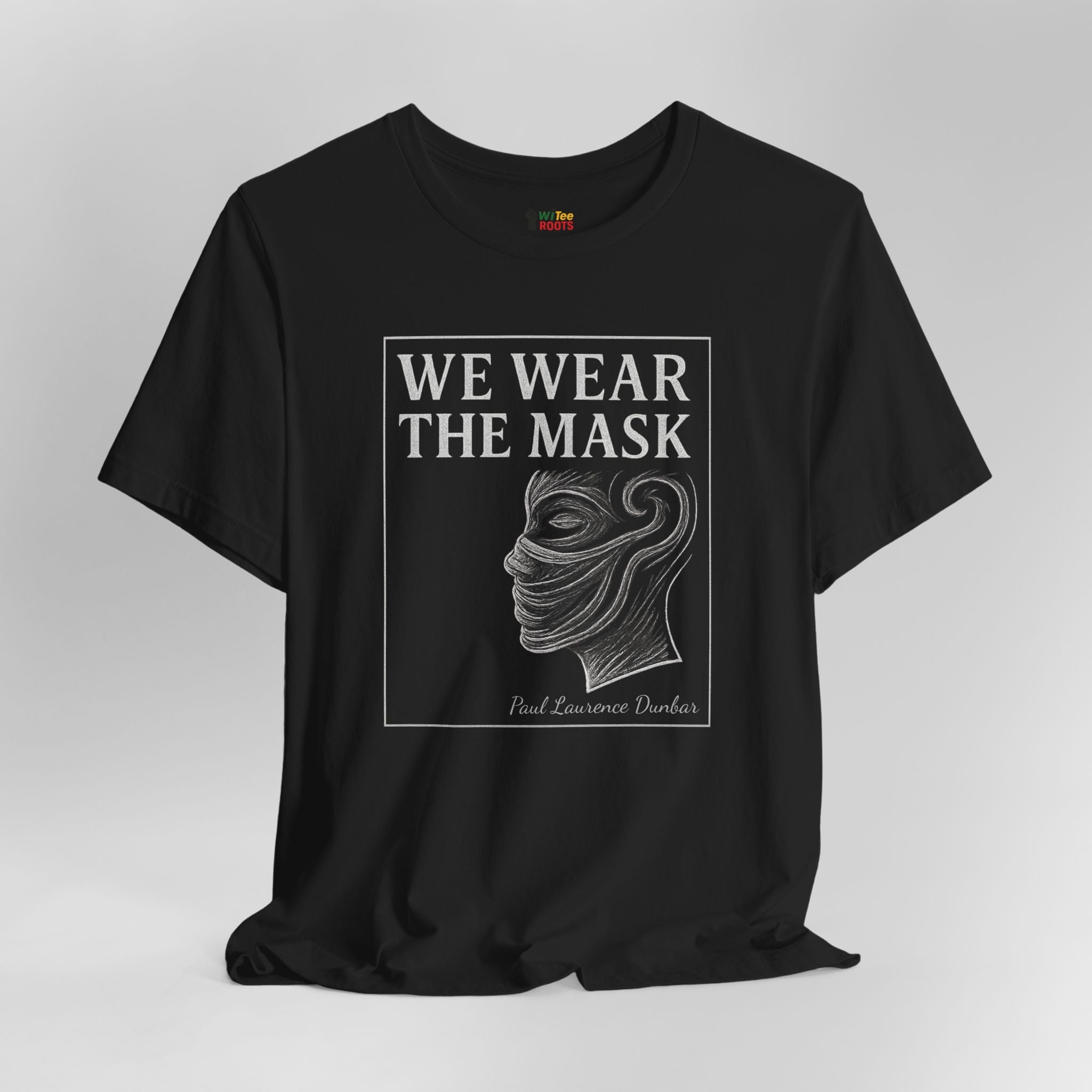 Black t-shirt with 'We Wear the Mask' graphic and text on a white background
