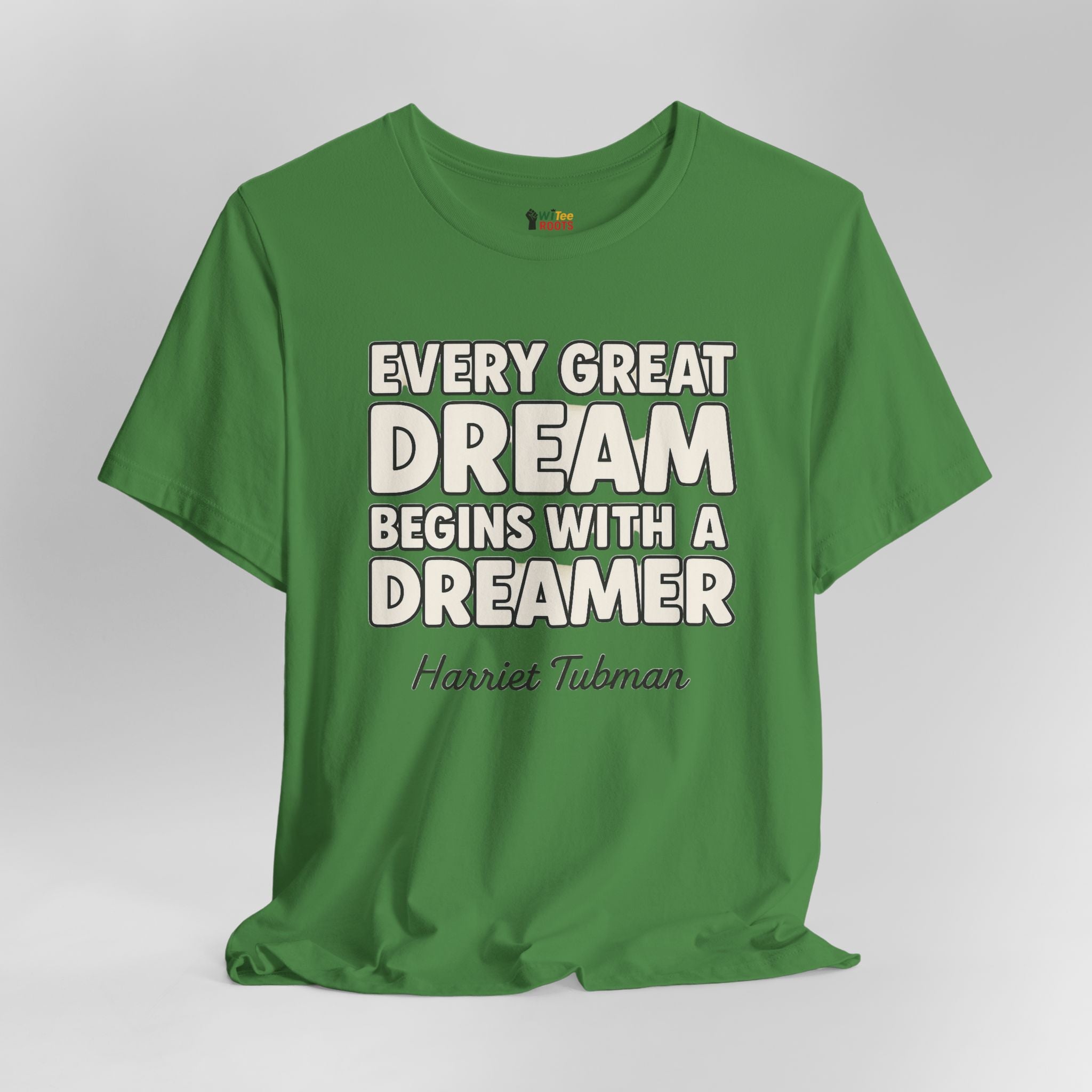 Green t-shirt with motivational quote on a gray background