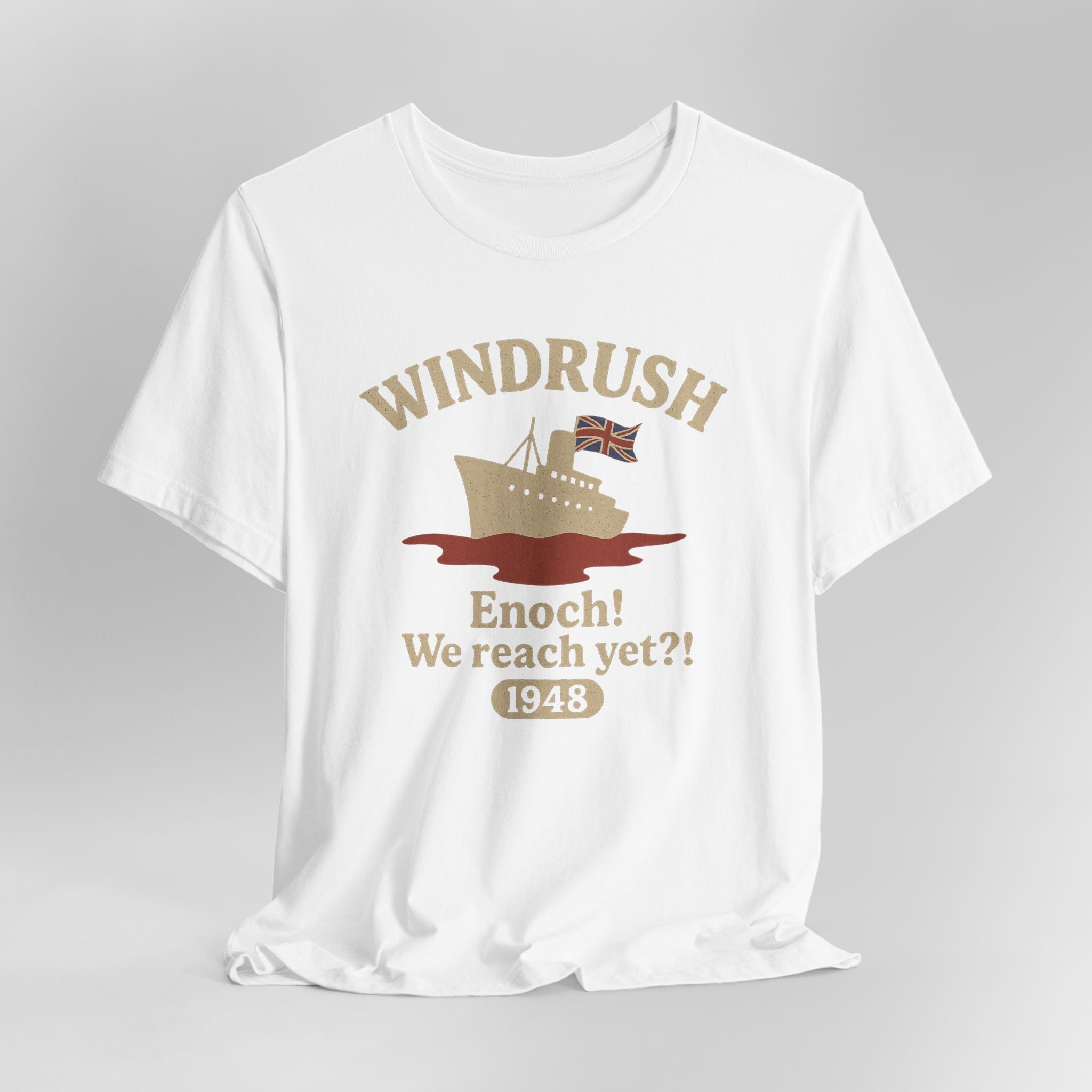 White t-shirt with 'Windrush' design featuring a ship and text on a gray background