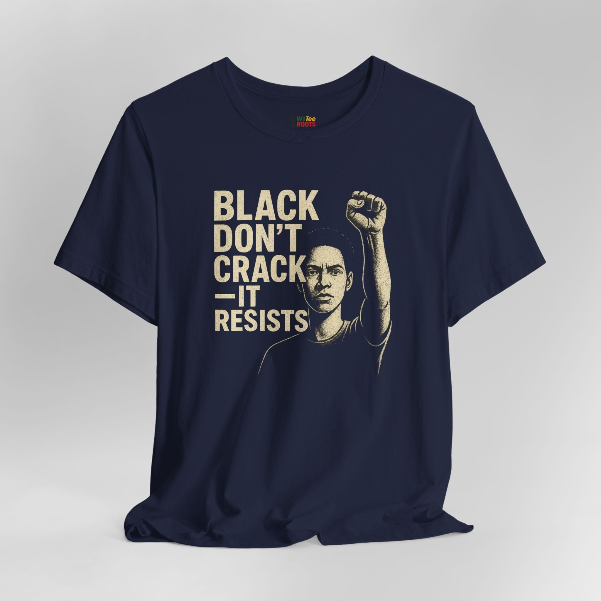 Navy blue t-shirt with graphic of a person raising a fist and text 'BLACK DON'T CRACK IT RESISTS' on a gray background