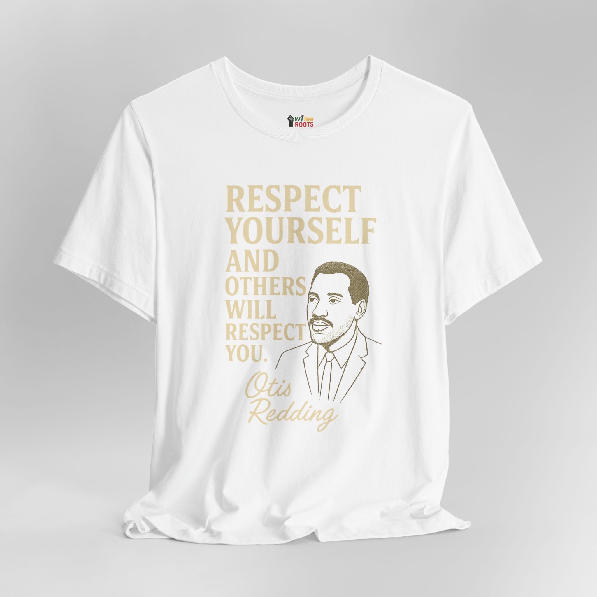 White t-shirt with gold text and a portrait on a gray background