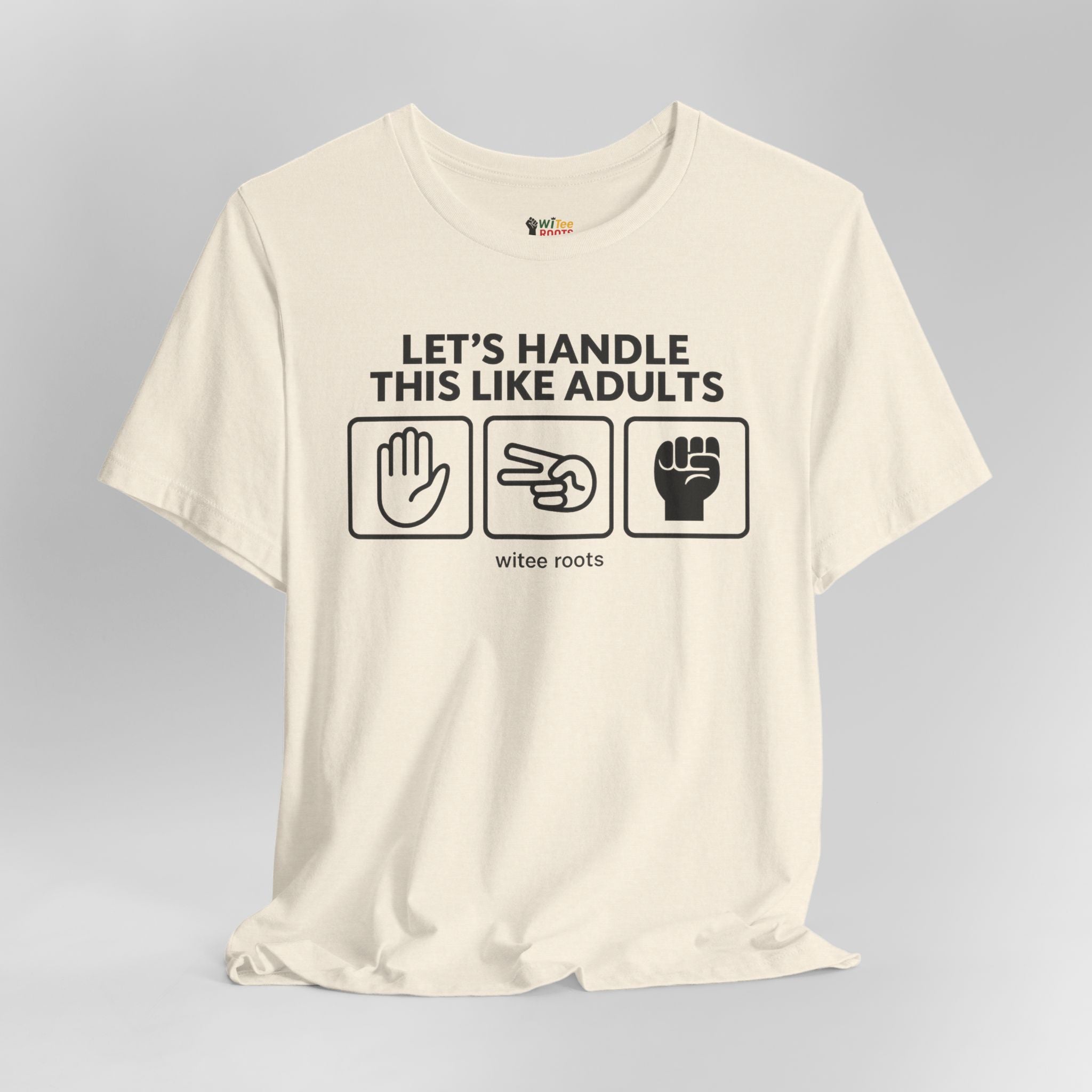 Beige t-shirt with black text and graphics on a gray background