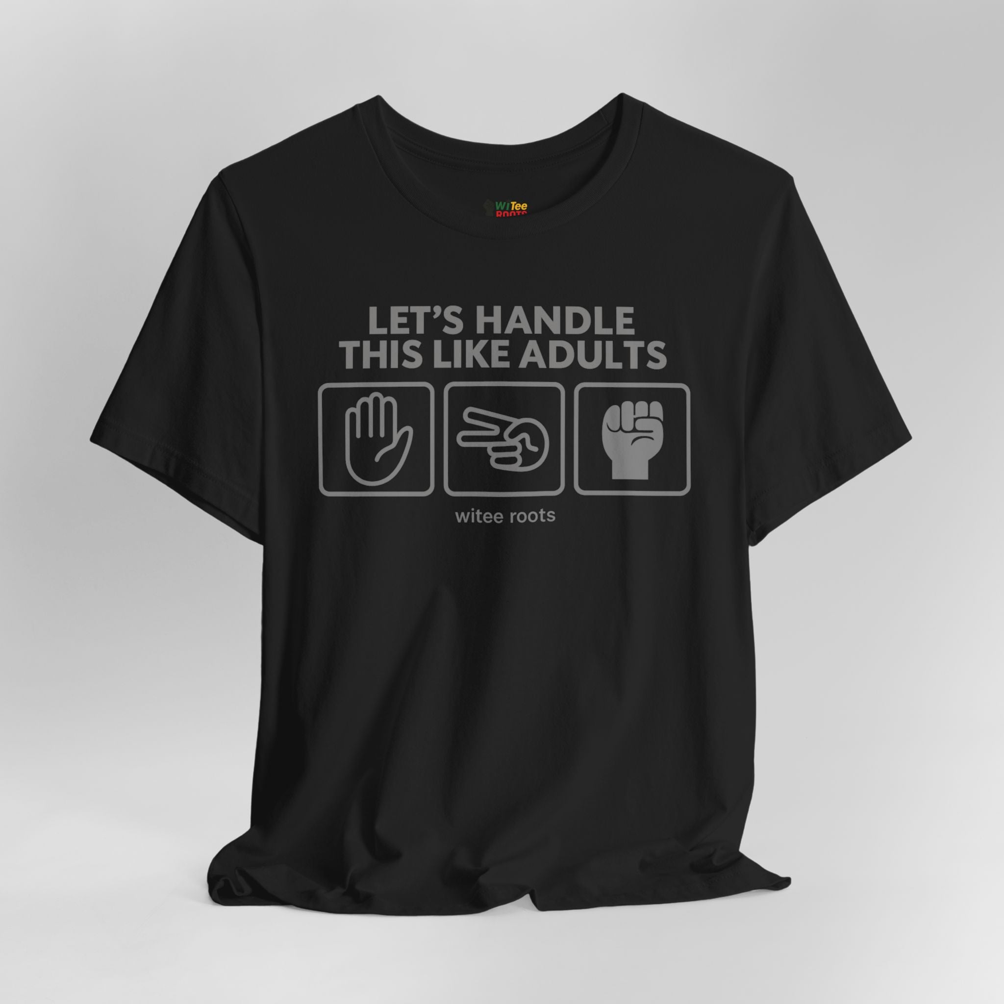 Black t-shirt with text and icons on a gray background