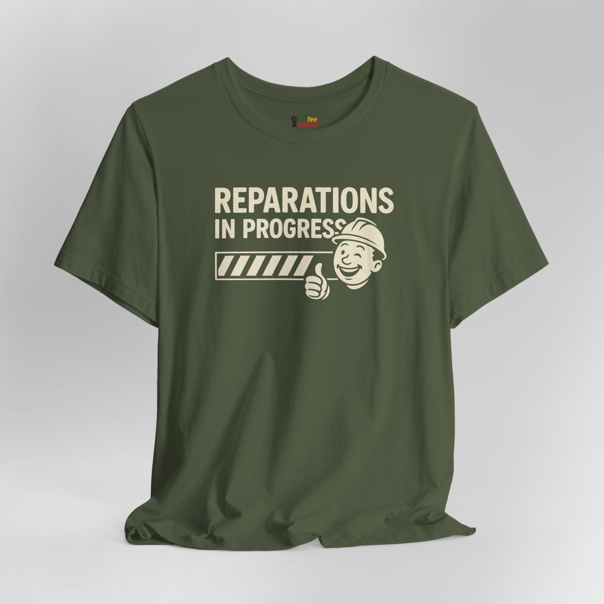 Green t-shirt with 'Reparations in Progress' graphic on a gray background