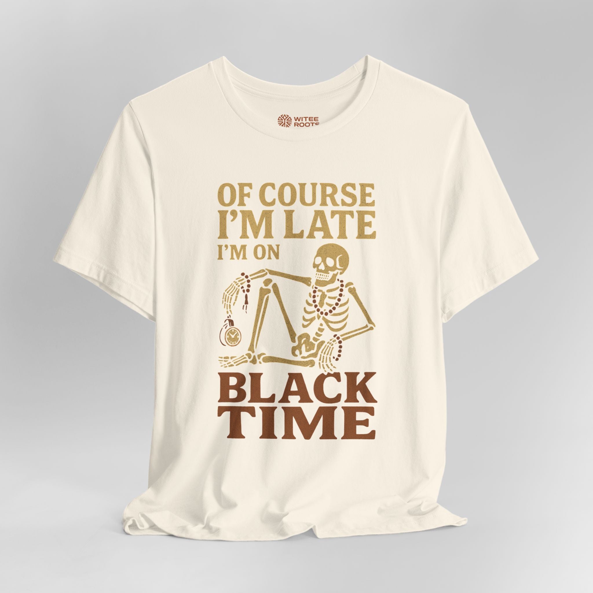 White t-shirt with skeleton graphic and text on a gray background