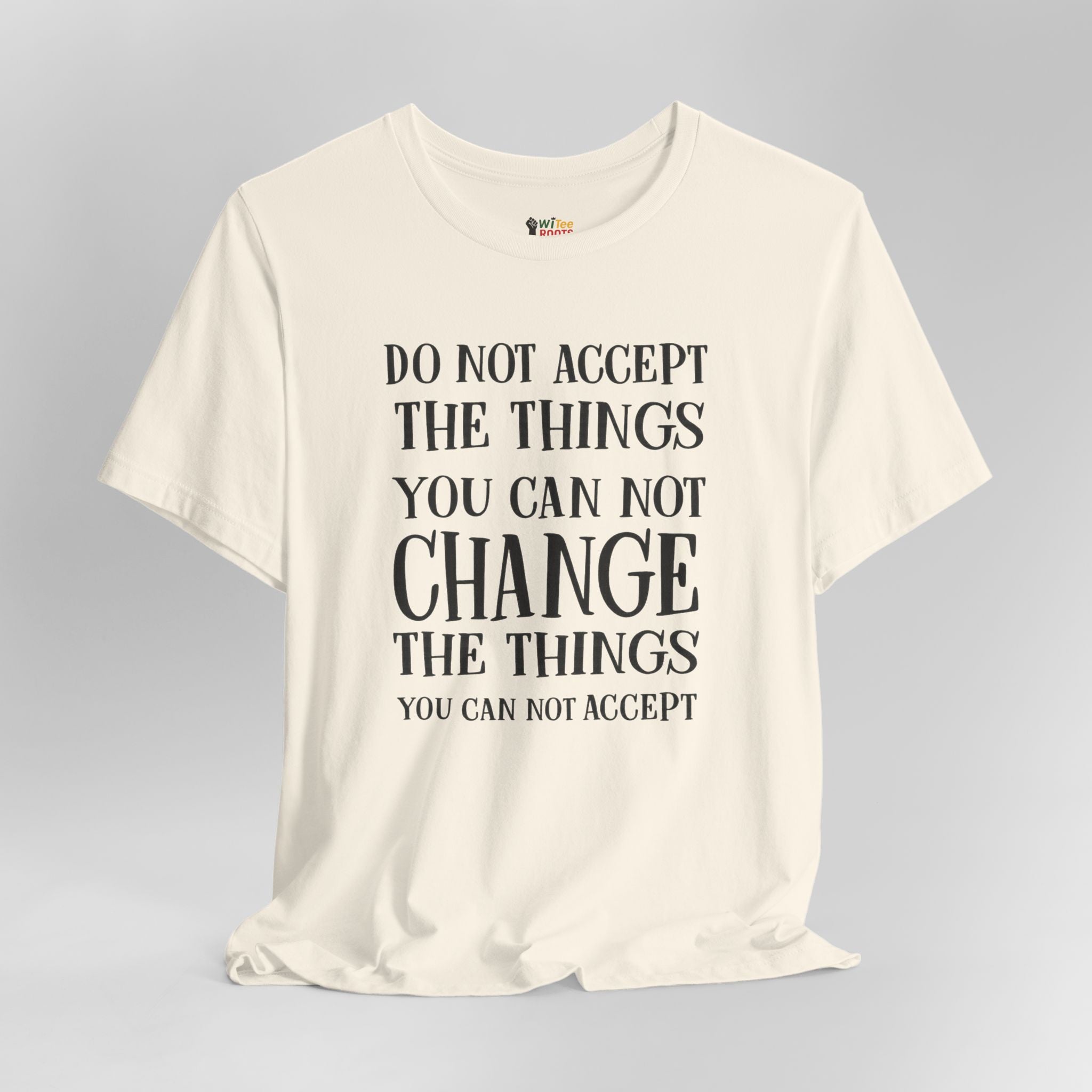 Beige t-shirt with motivational quote on a gray background