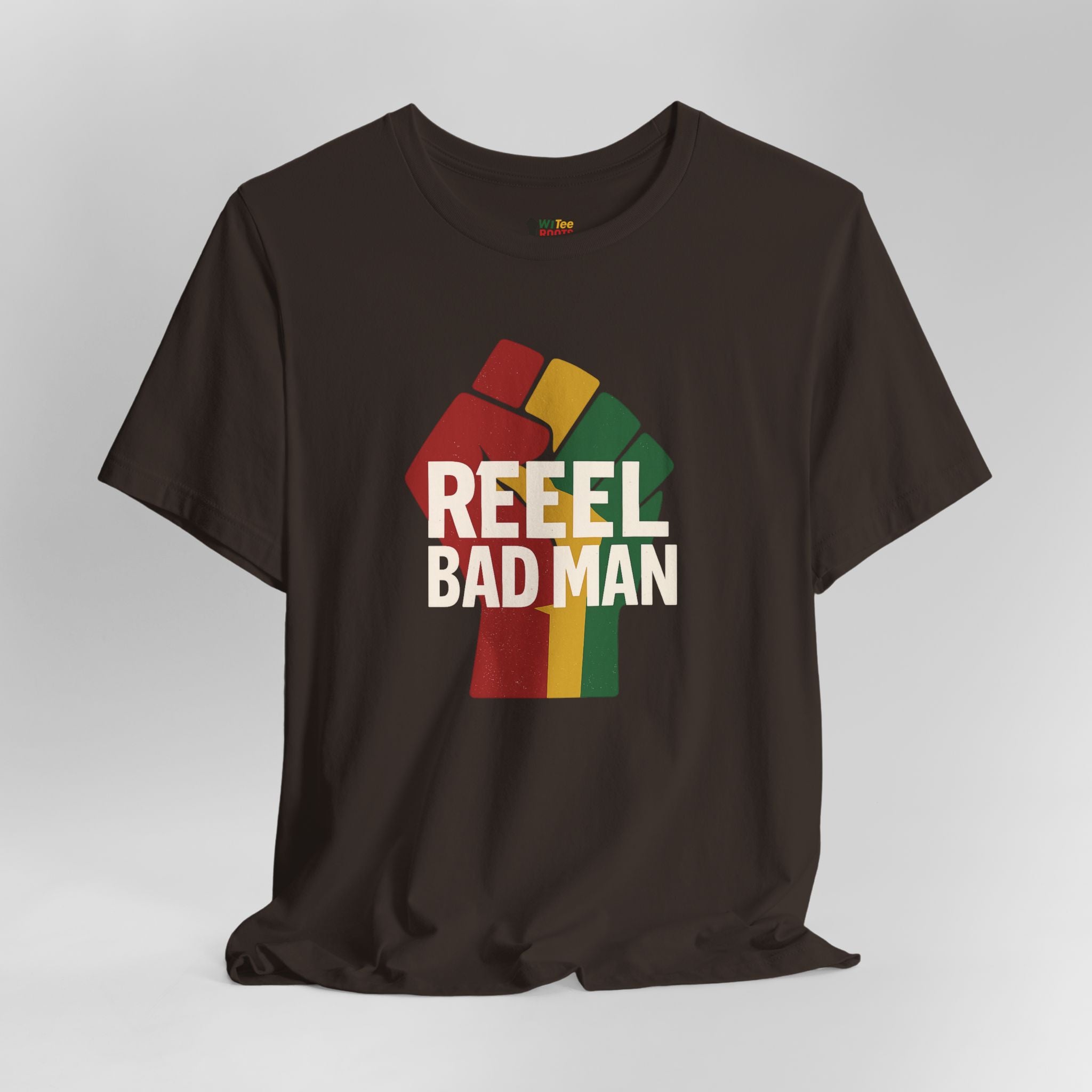 Black t-shirt with colorful graphic and 'REEEL BAD MAN' text on a gray background