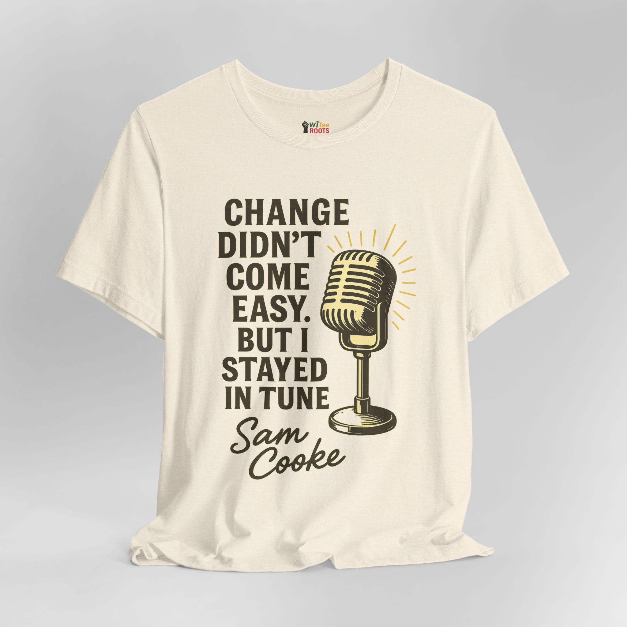 White t-shirt with a microphone graphic and text on a gray background