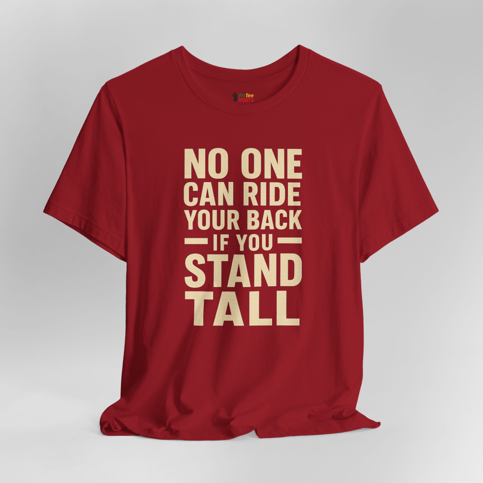 Red t-shirt with motivational quote on a gray background