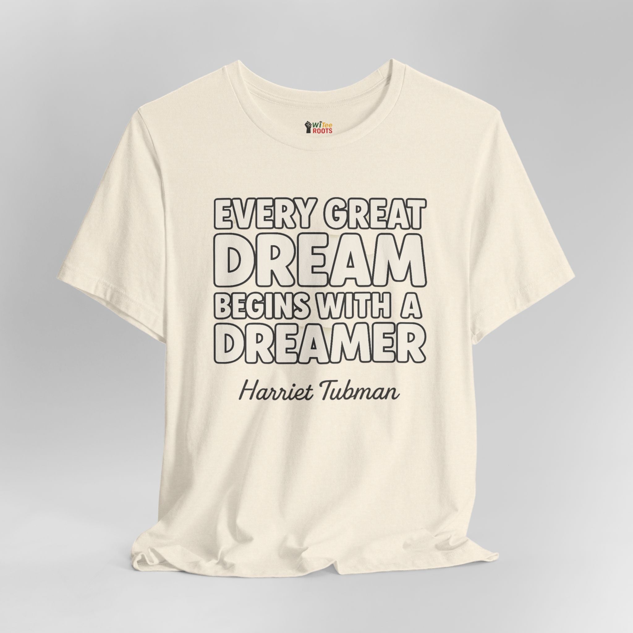 Beige t-shirt with motivational quote on a gray background