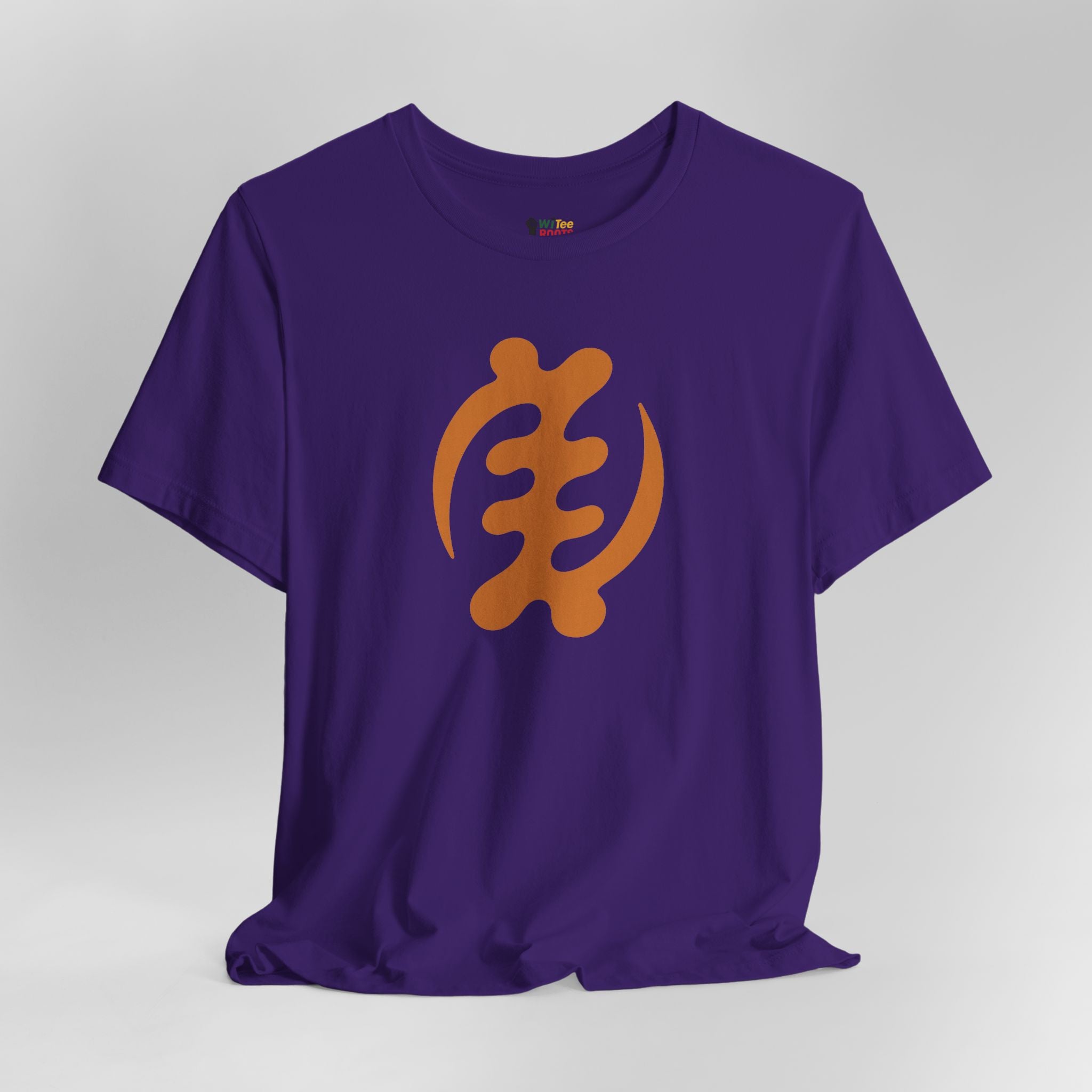 Purple t-shirt with an orange symbol on a gray background