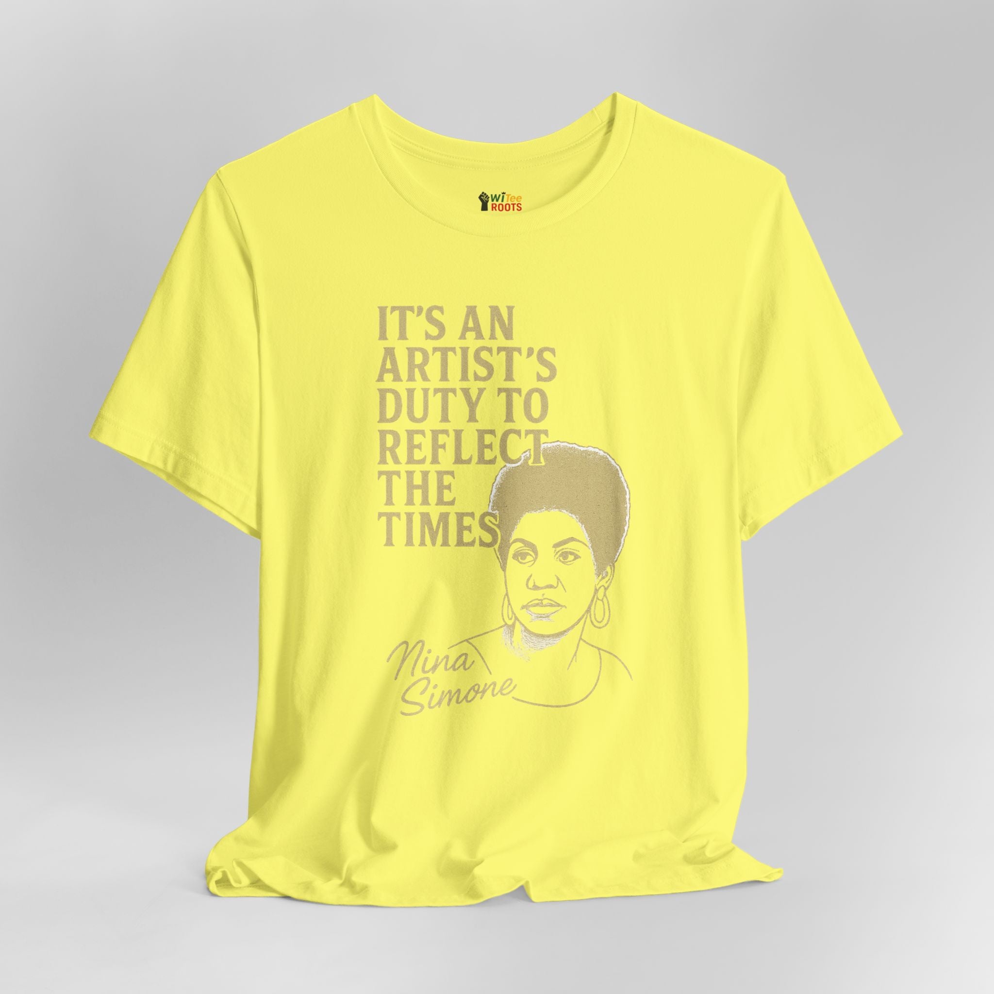 Yellow t-shirt with a graphic of Nina Simone and text on a gray background